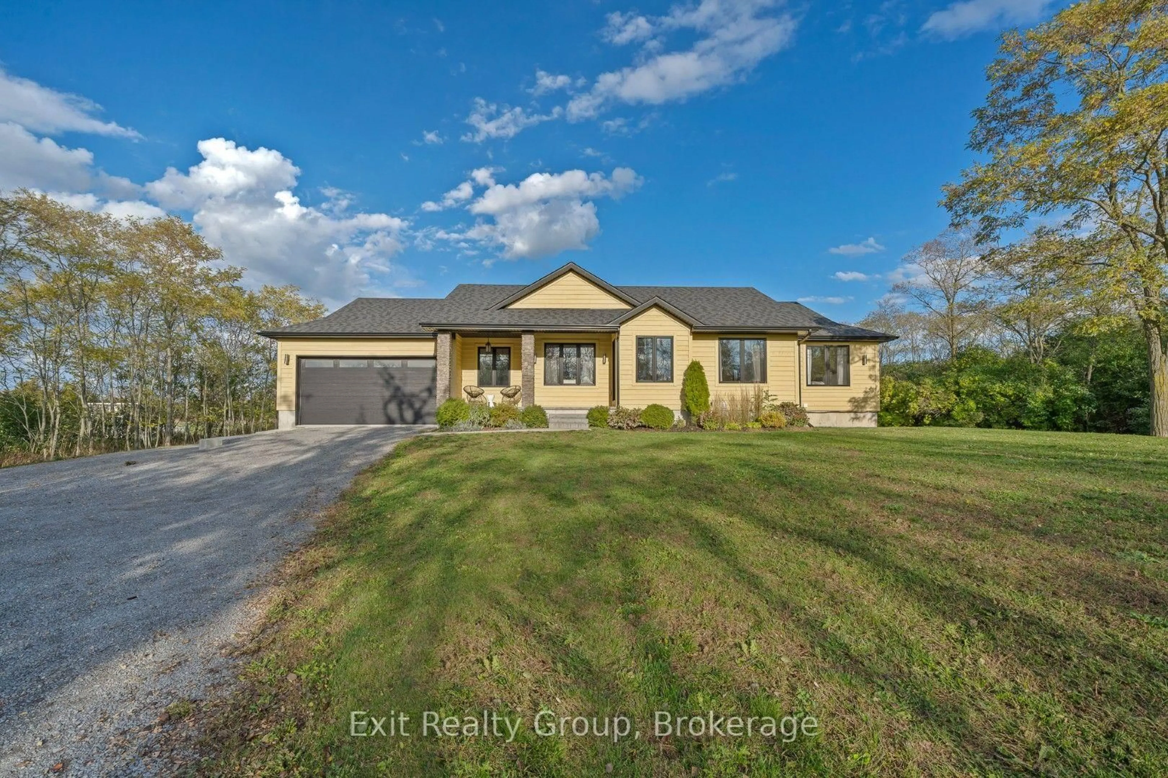 A pic from outside/outdoor area/front of a property/back of a property/a pic from drone, unknown for 20858 Loyalist Pkwy, Prince Edward County Ontario K0K 1L0