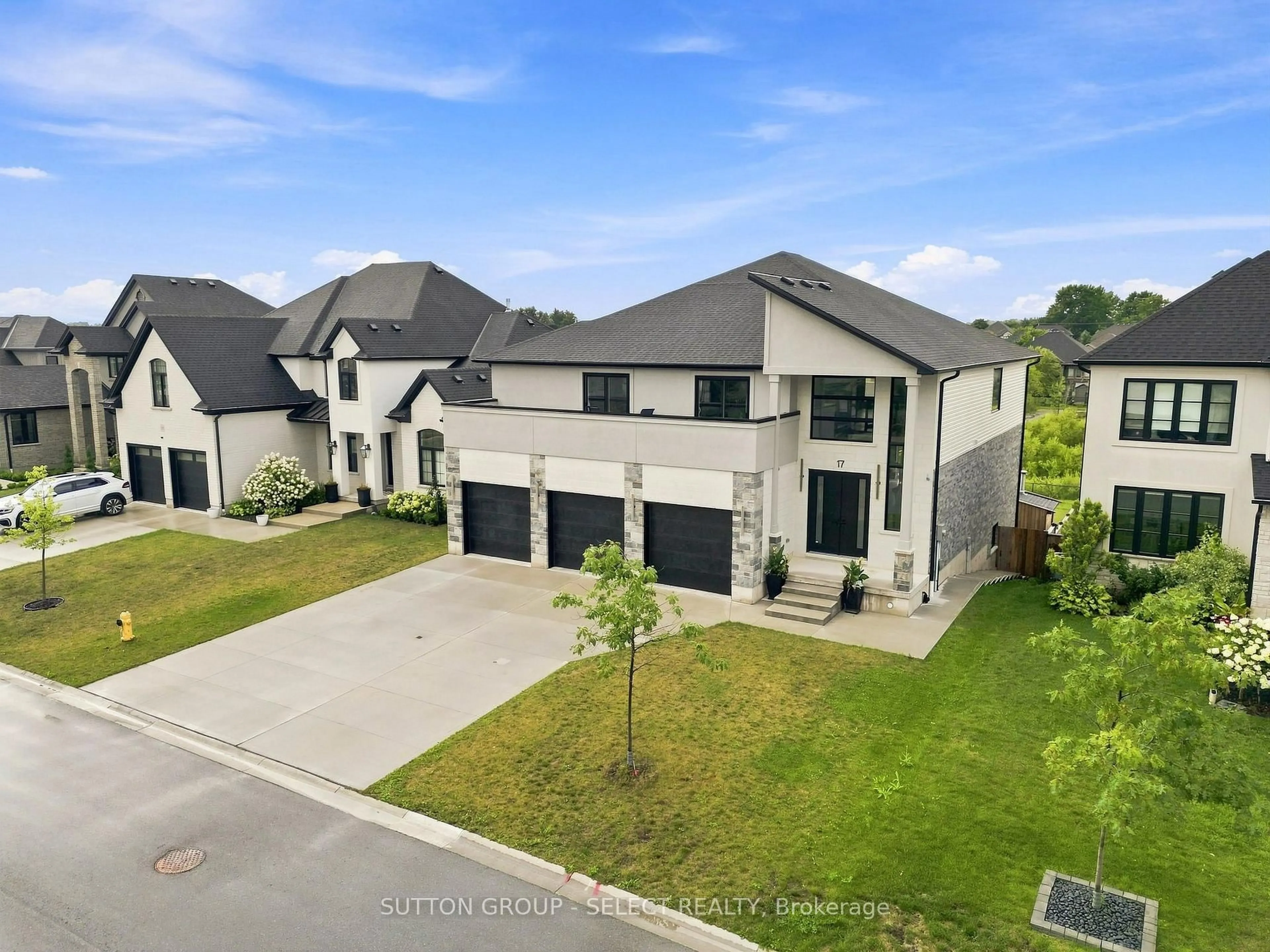 A pic from outside/outdoor area/front of a property/back of a property/a pic from drone, street for 17 Arrowwood Path, Middlesex Centre Ontario N0M 2A0
