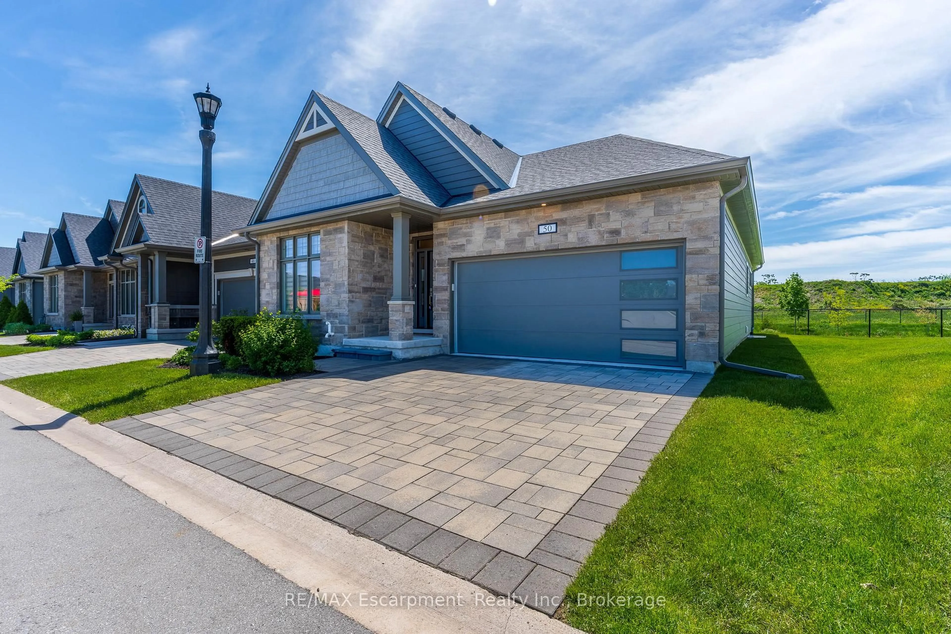 Home with brick exterior material, street for 154 Port Robinson Rd #50, Pelham Ontario L0S 1E6