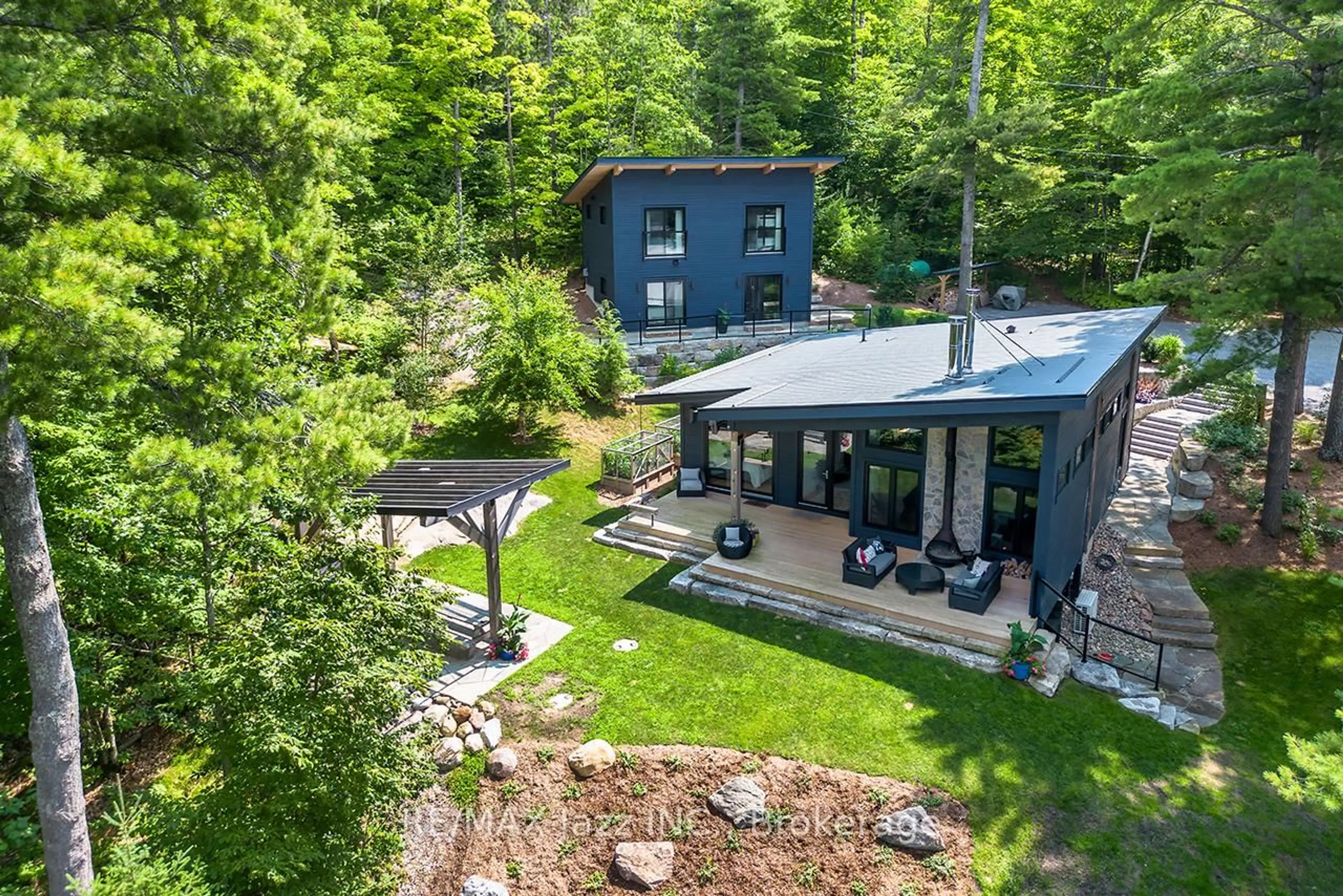 A pic from outside/outdoor area/front of a property/back of a property/a pic from drone, forest/trees view for 88 Brock Rd, North Kawartha Ontario K0L 1A0
