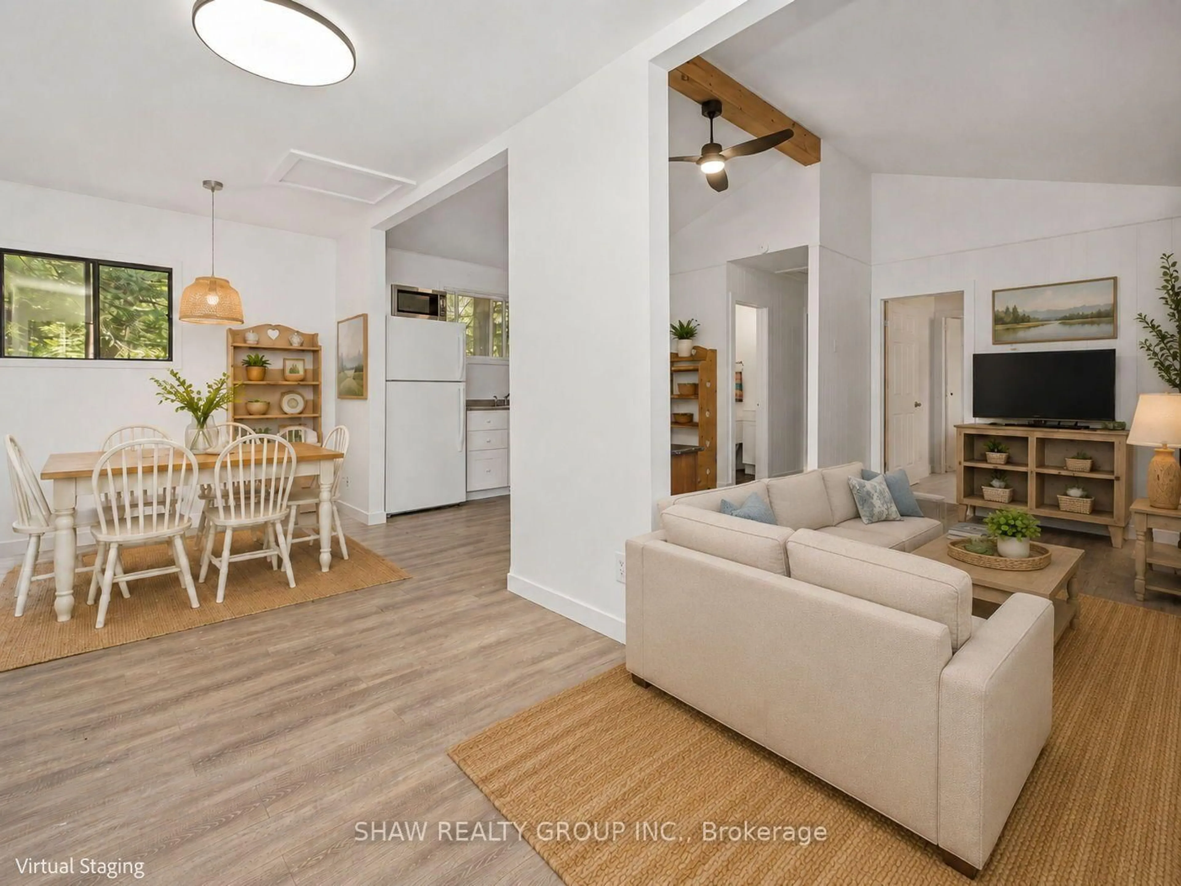 Living room with furniture, wood/laminate floor for 69 North Dr, Huntsville Ontario P1H 2J2
