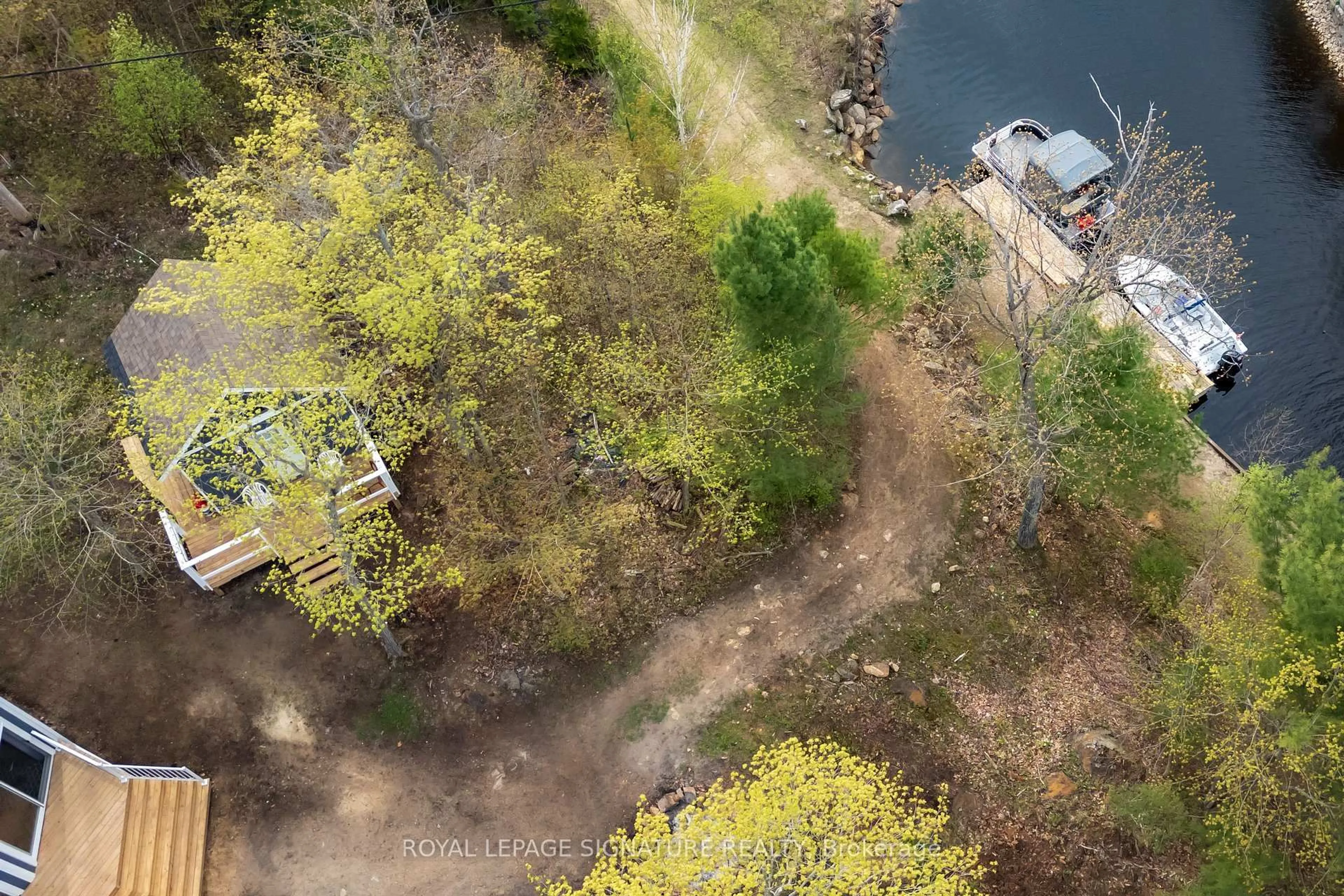 A pic from outside/outdoor area/front of a property/back of a property/a pic from drone, water/lake/river/ocean view for 9316 Georgian Bay Shore Rd, Georgian Bay Ontario P0E 1E0