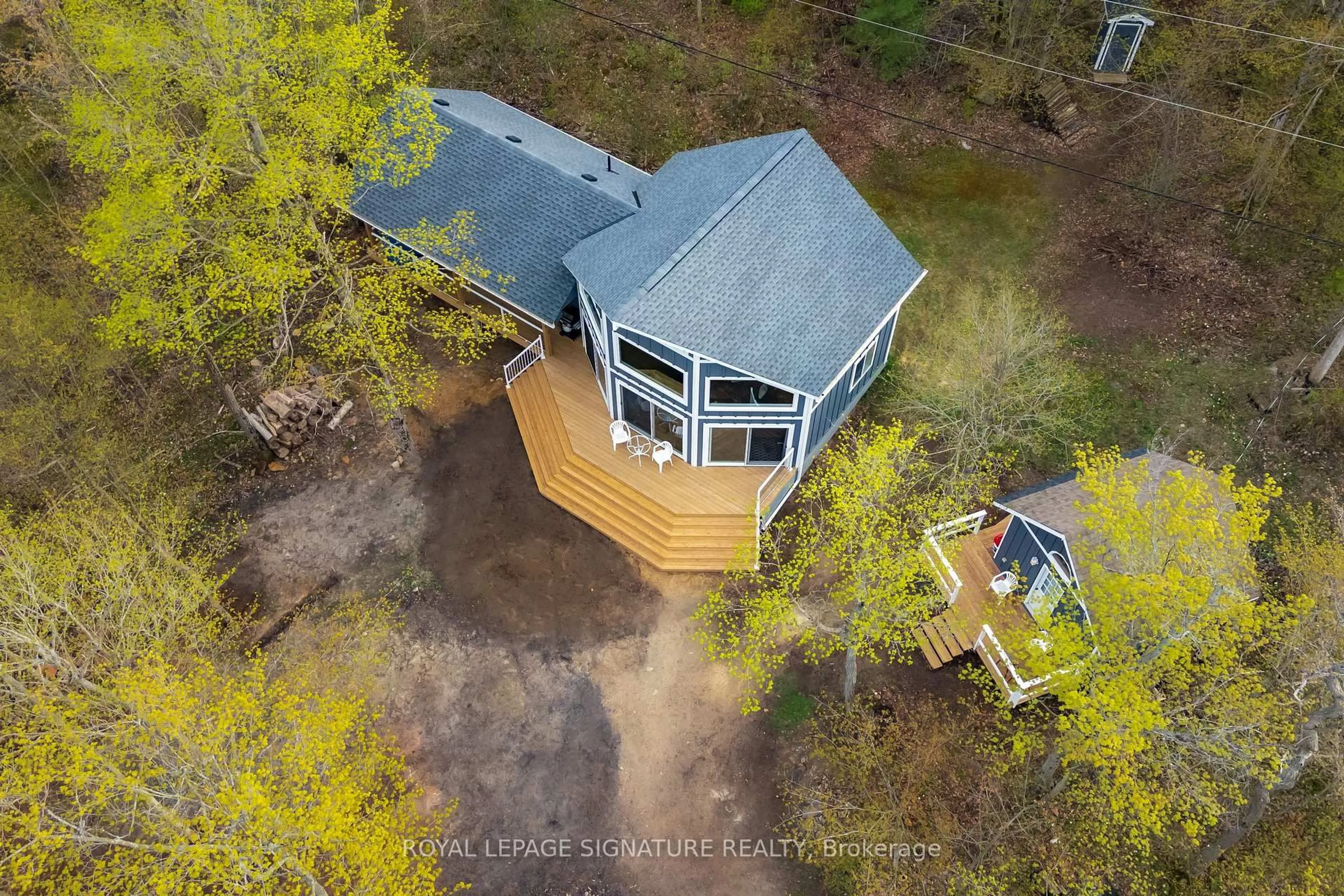 A pic from outside/outdoor area/front of a property/back of a property/a pic from drone, water/lake/river/ocean view for 9316 Georgian Bay Shore Rd, Georgian Bay Ontario P0E 1E0