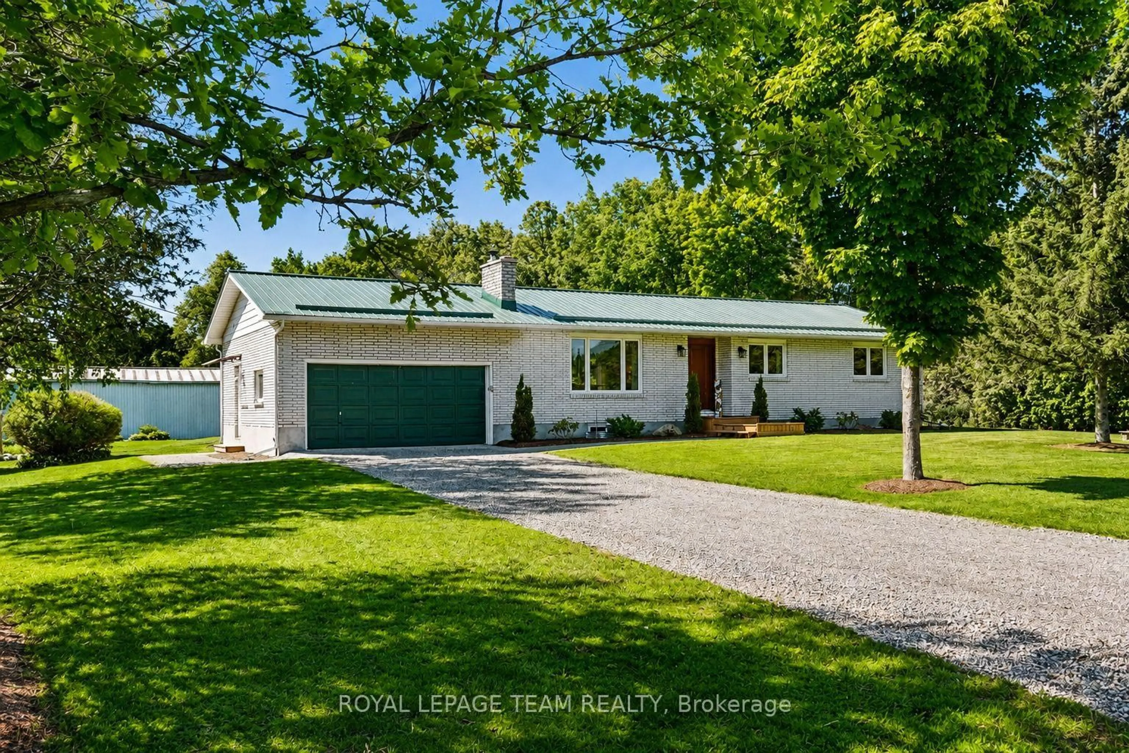 A pic from outside/outdoor area/front of a property/back of a property/a pic from drone, street for 512 Edward Scott Rd, North Grenville Ontario K0G 1J0