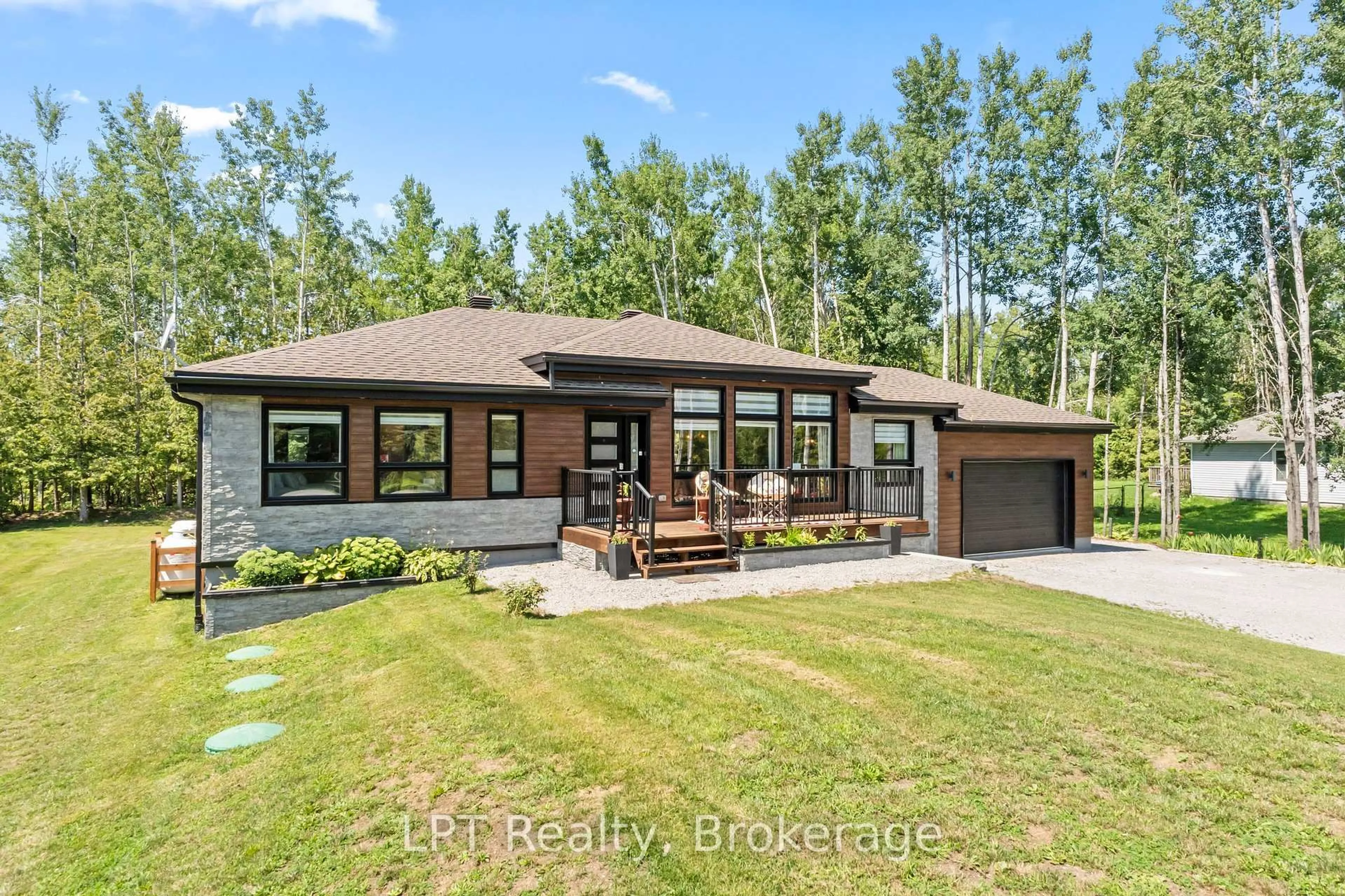 Home with brick exterior material, unknown for 61 Pinewood Blvd, Kawartha Lakes Ontario K0M 2T0