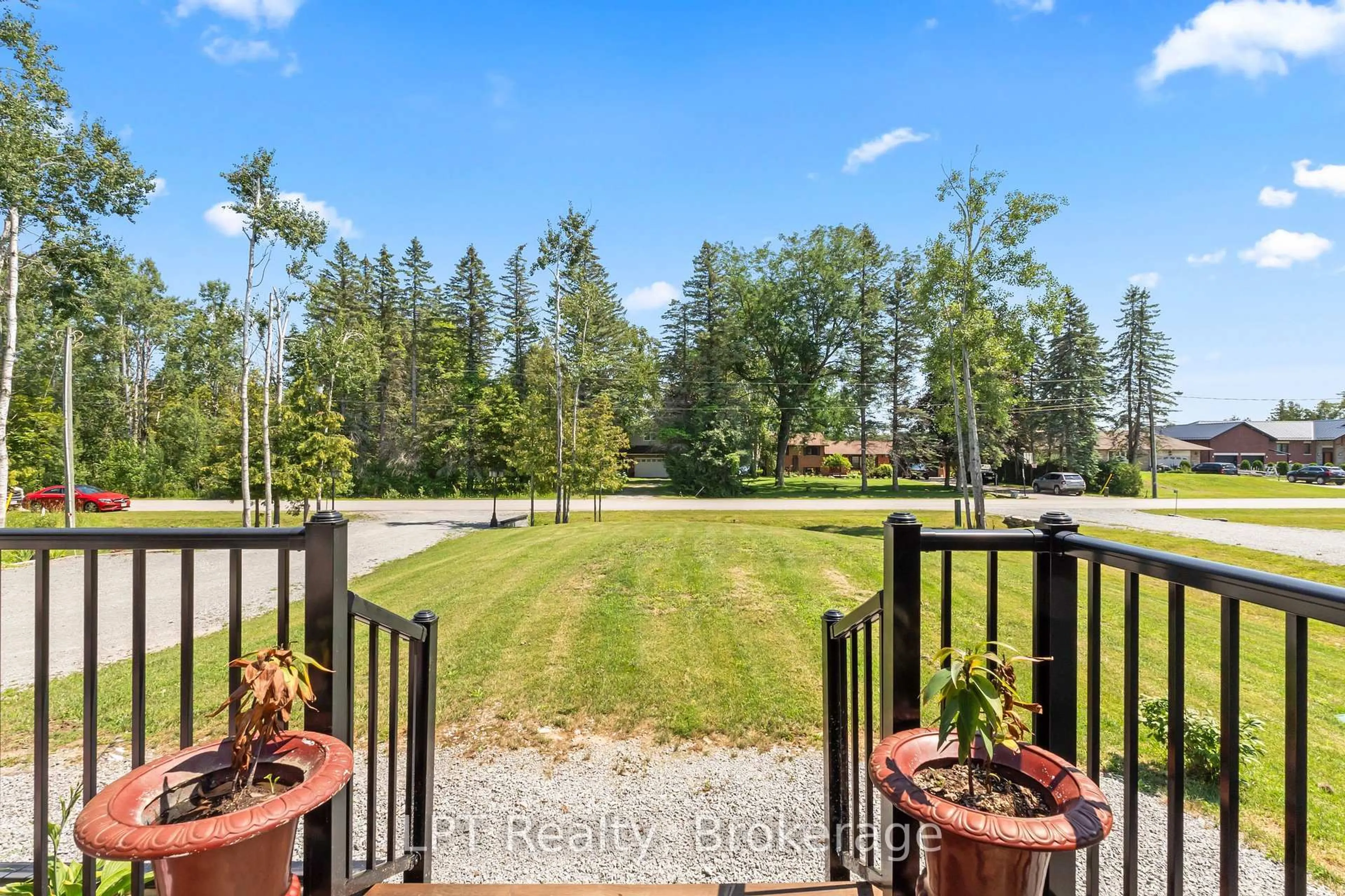 A pic from outside/outdoor area/front of a property/back of a property/a pic from drone, water/lake/river/ocean view for 61 Pinewood Blvd, Kawartha Lakes Ontario K0M 2T0