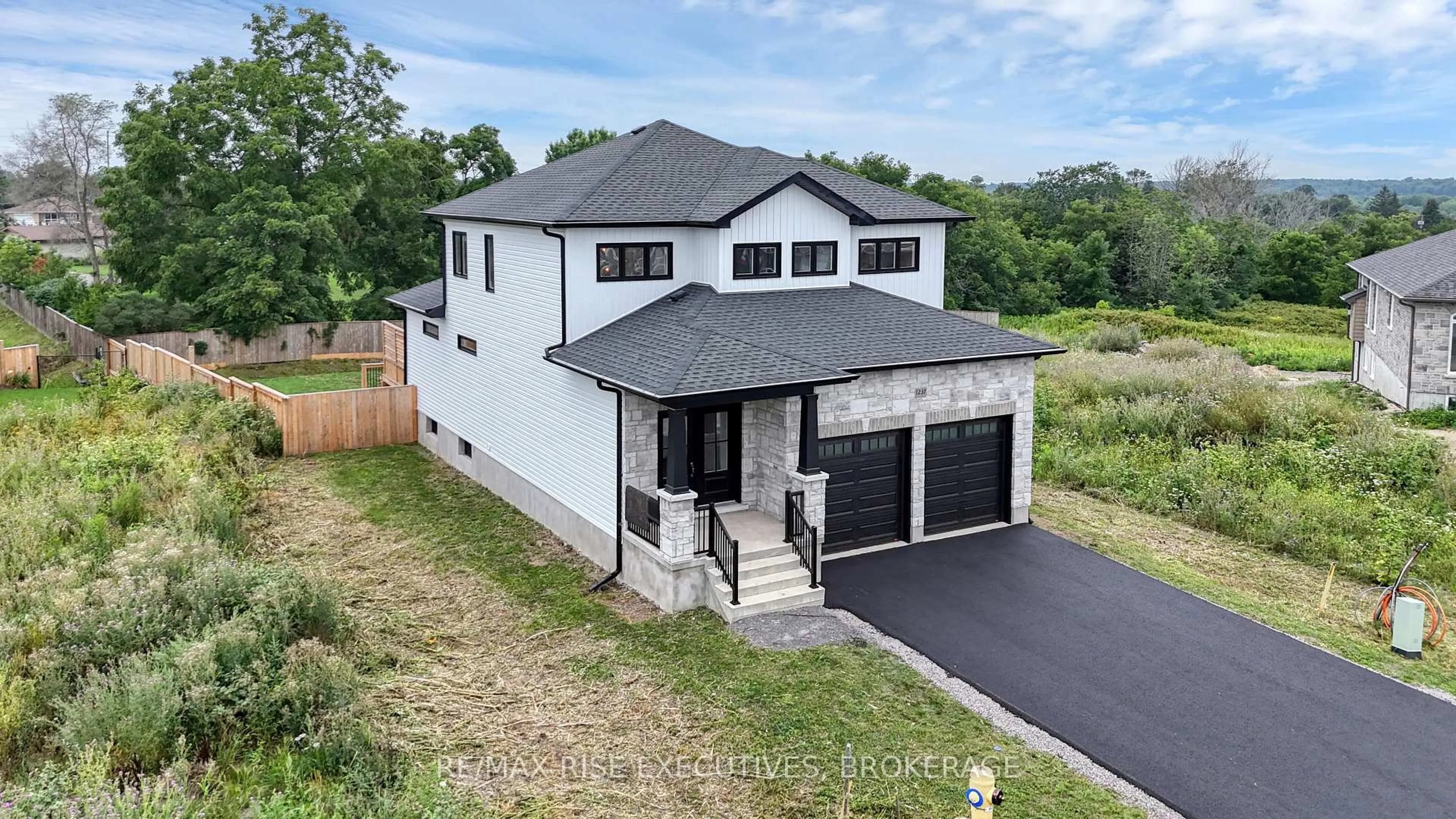 A pic from outside/outdoor area/front of a property/back of a property/a pic from drone, unknown for 1237 Carfa Cres, Kingston Ontario K7P 0M7