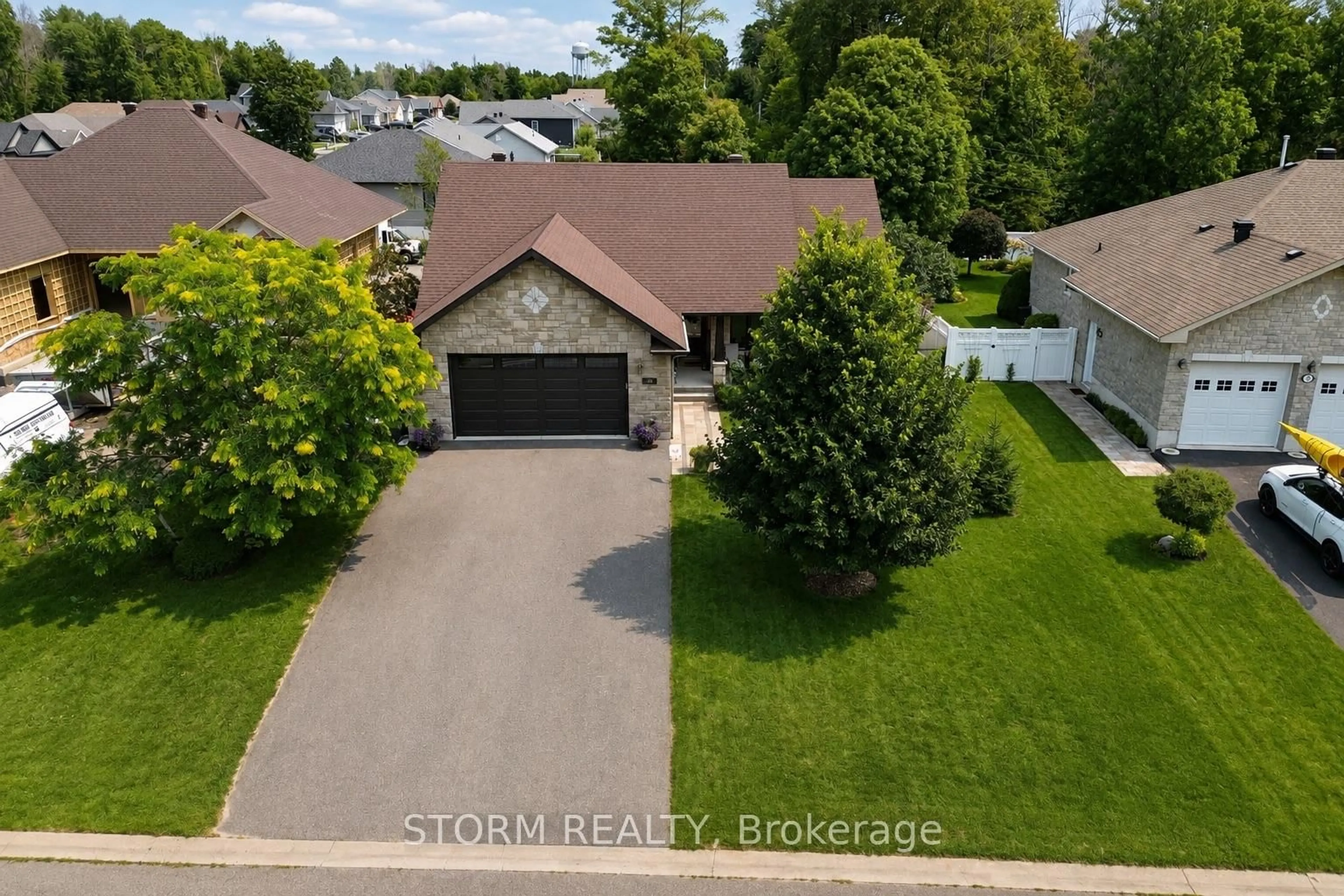 A pic from outside/outdoor area/front of a property/back of a property/a pic from drone, street for 40 Ault Dr, South Stormont Ontario K0C 1M0