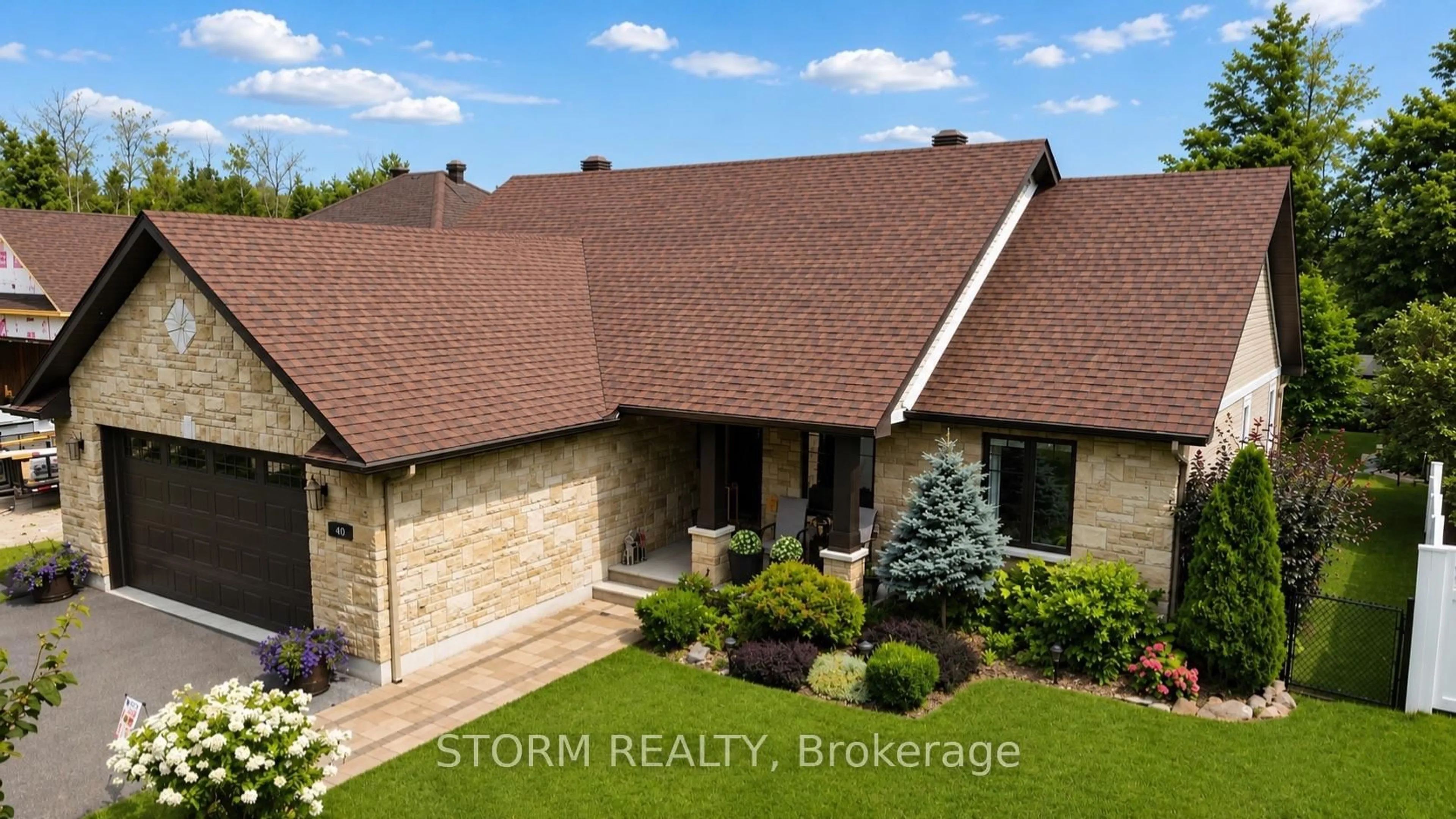 A pic from outside/outdoor area/front of a property/back of a property/a pic from drone, street for 40 Ault Dr, South Stormont Ontario K0C 1M0