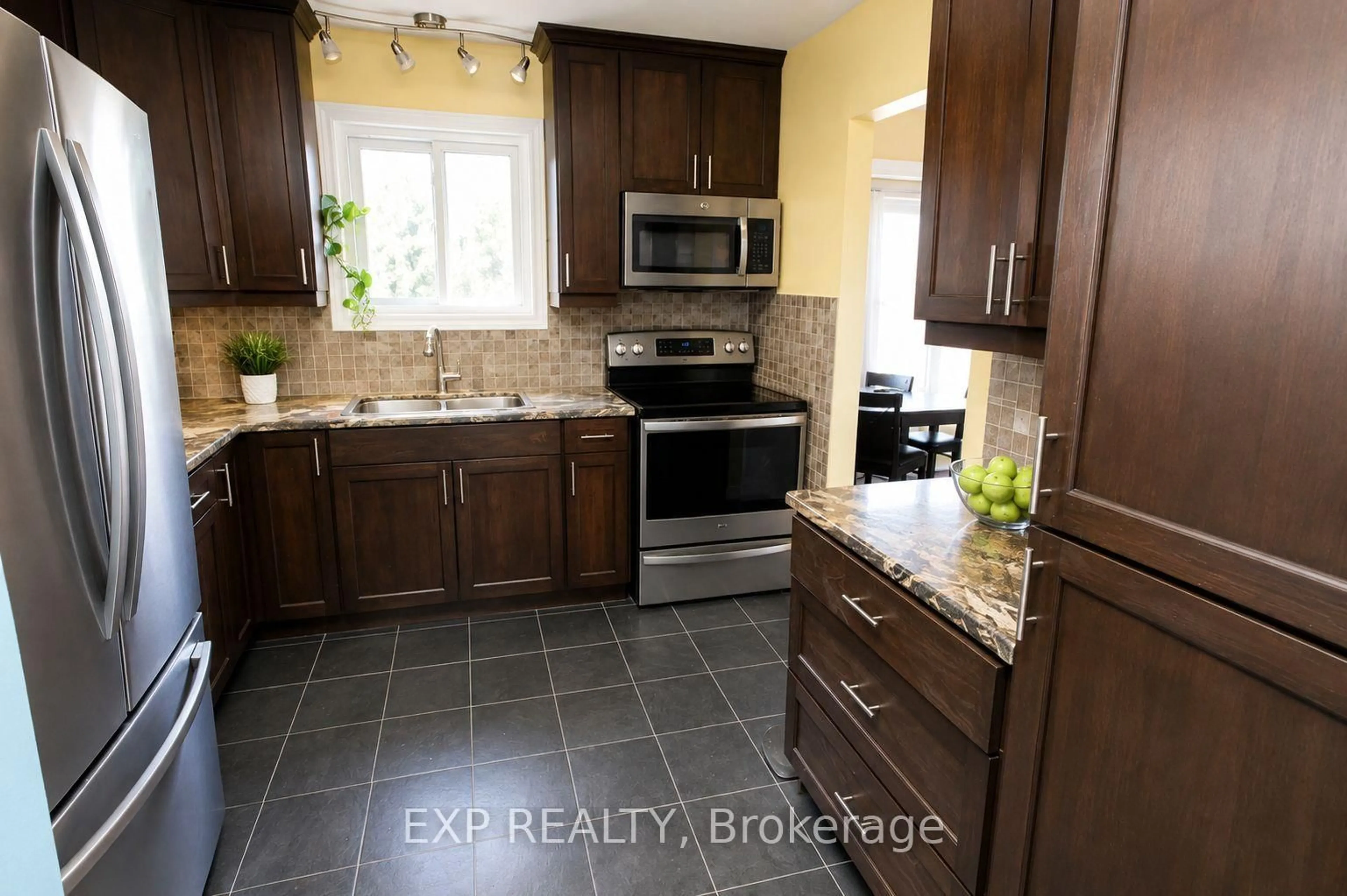 Open concept kitchen, ceramic/tile floor for 110 Purdy Rd, Bath Ontario K0H 1G0
