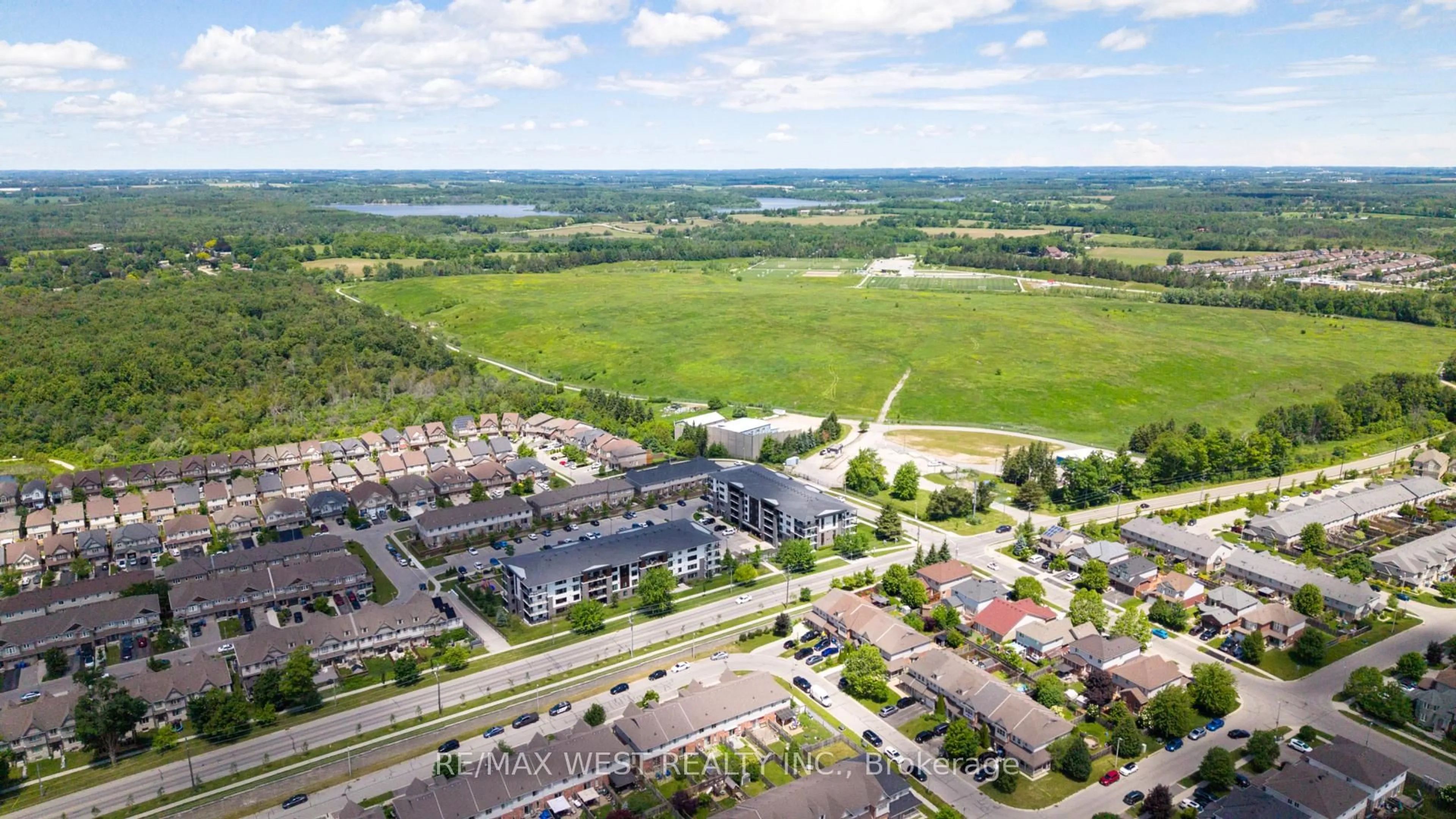 A pic from outside/outdoor area/front of a property/back of a property/a pic from drone, unknown for 108 SUMMIT RIDGE Dr #207, Guelph Ontario N1E 0P8