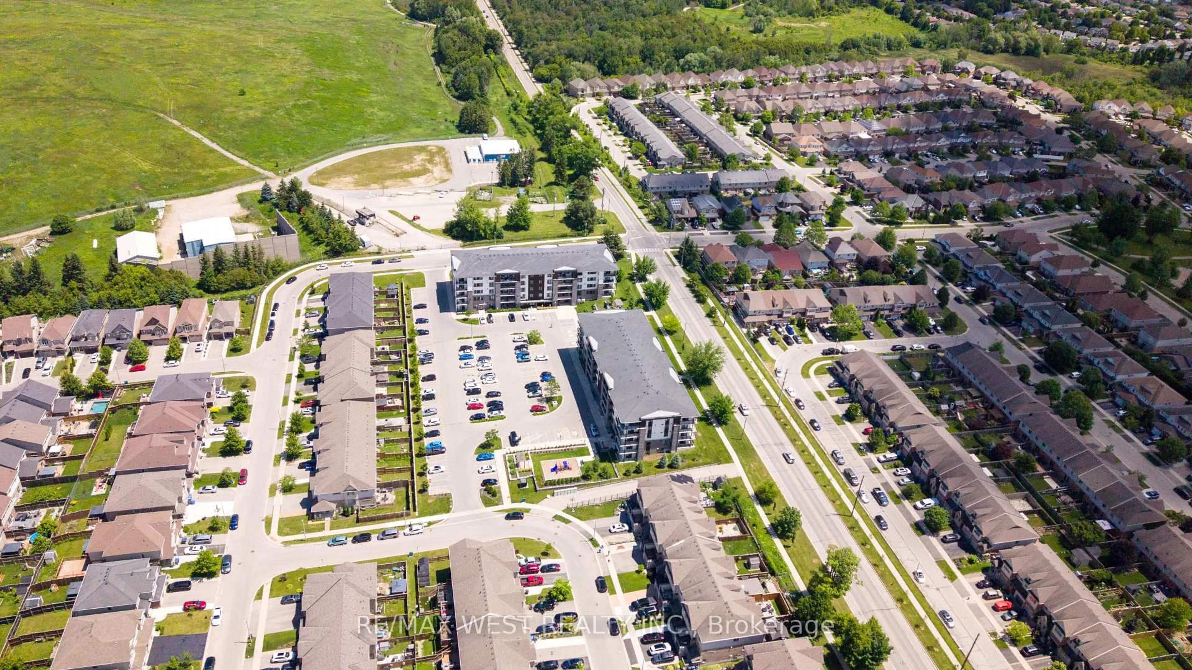 A pic from outside/outdoor area/front of a property/back of a property/a pic from drone, street for 108 SUMMIT RIDGE Dr #207, Guelph Ontario N1E 0P8