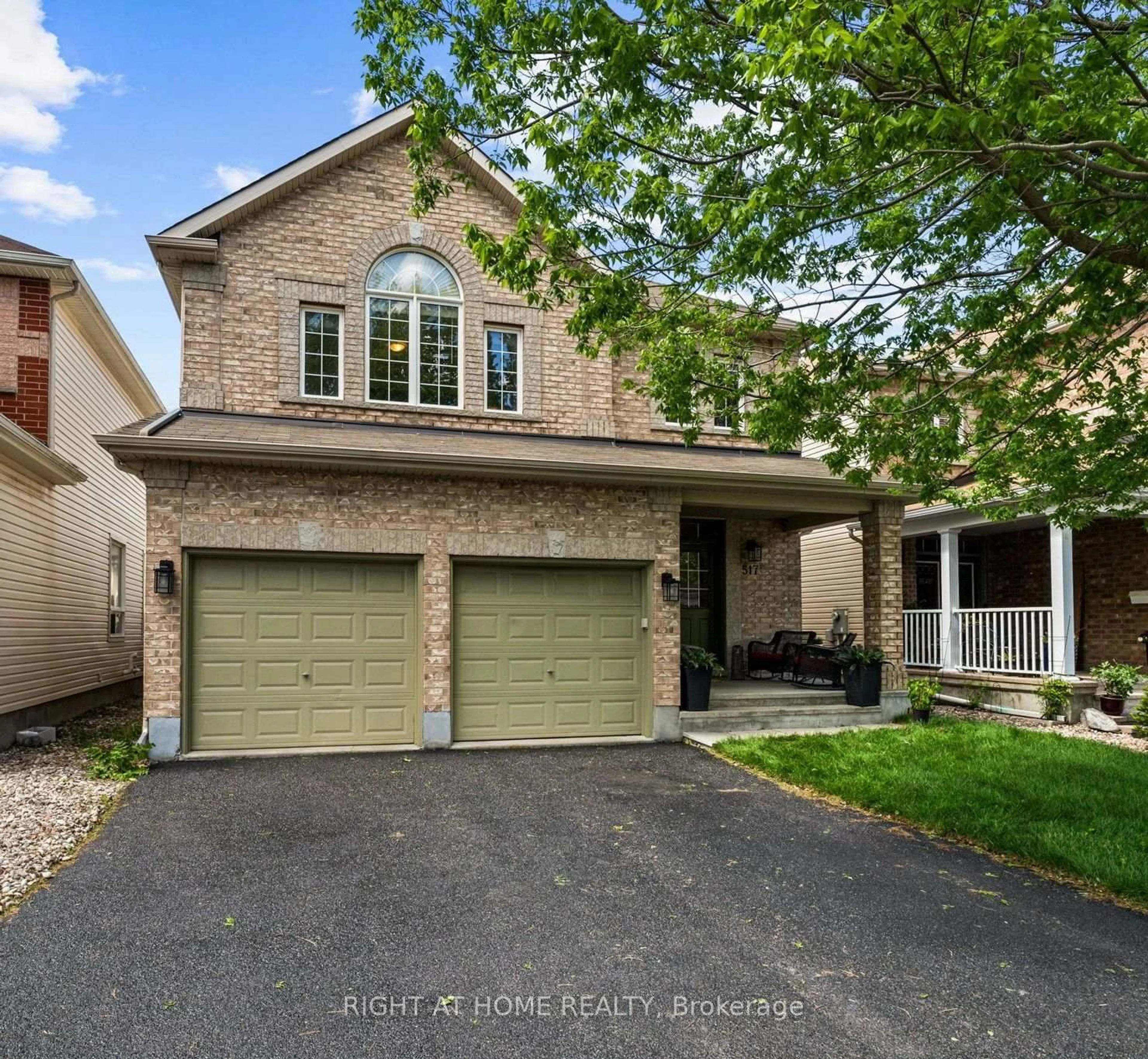 Home with brick exterior material, street for 517 STONECHURCH Way, Ottawa Ontario K2J 0C6