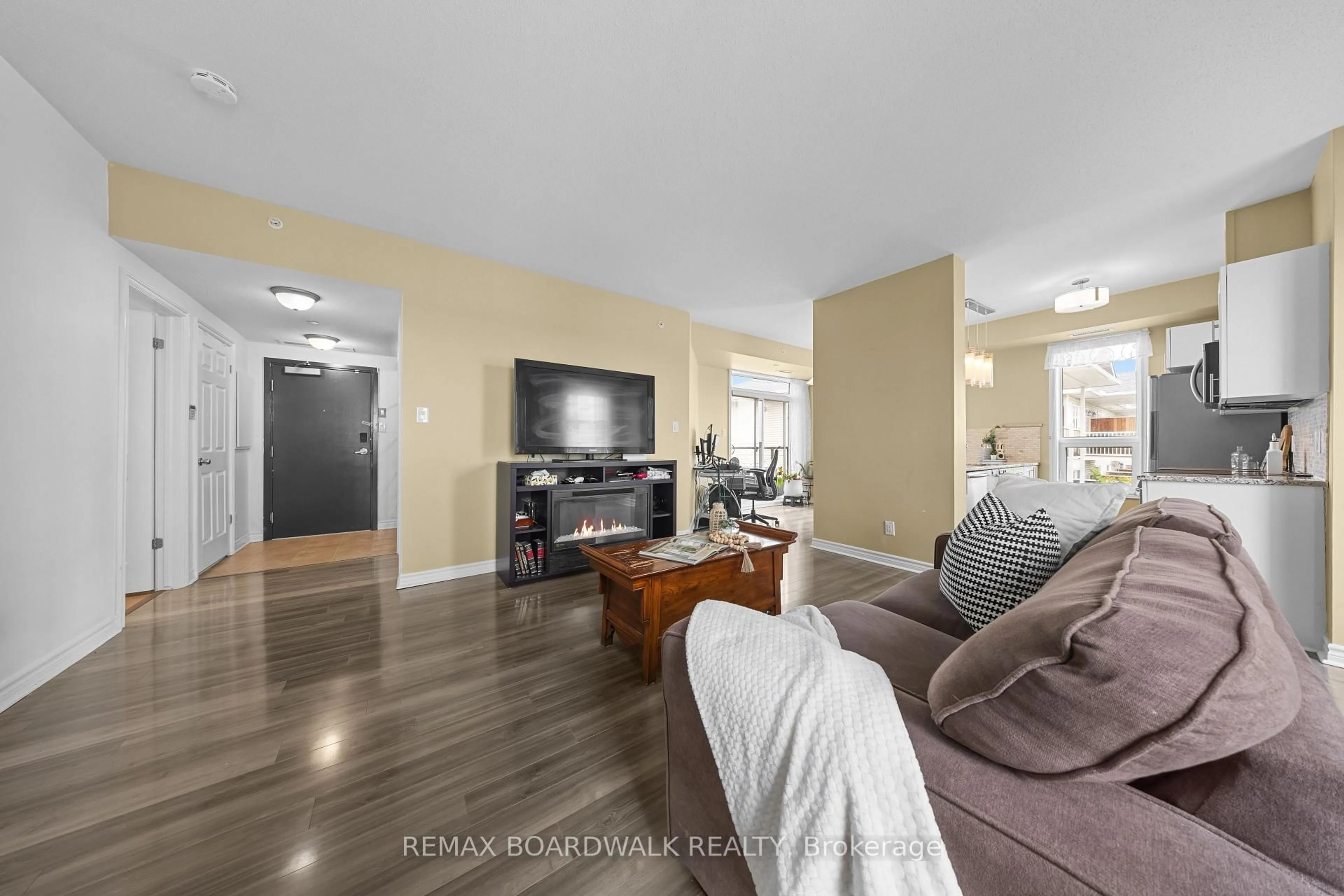Living room with furniture, unknown for 760 Chapman Mills Dr #302, Ottawa Ontario K2J 3V2