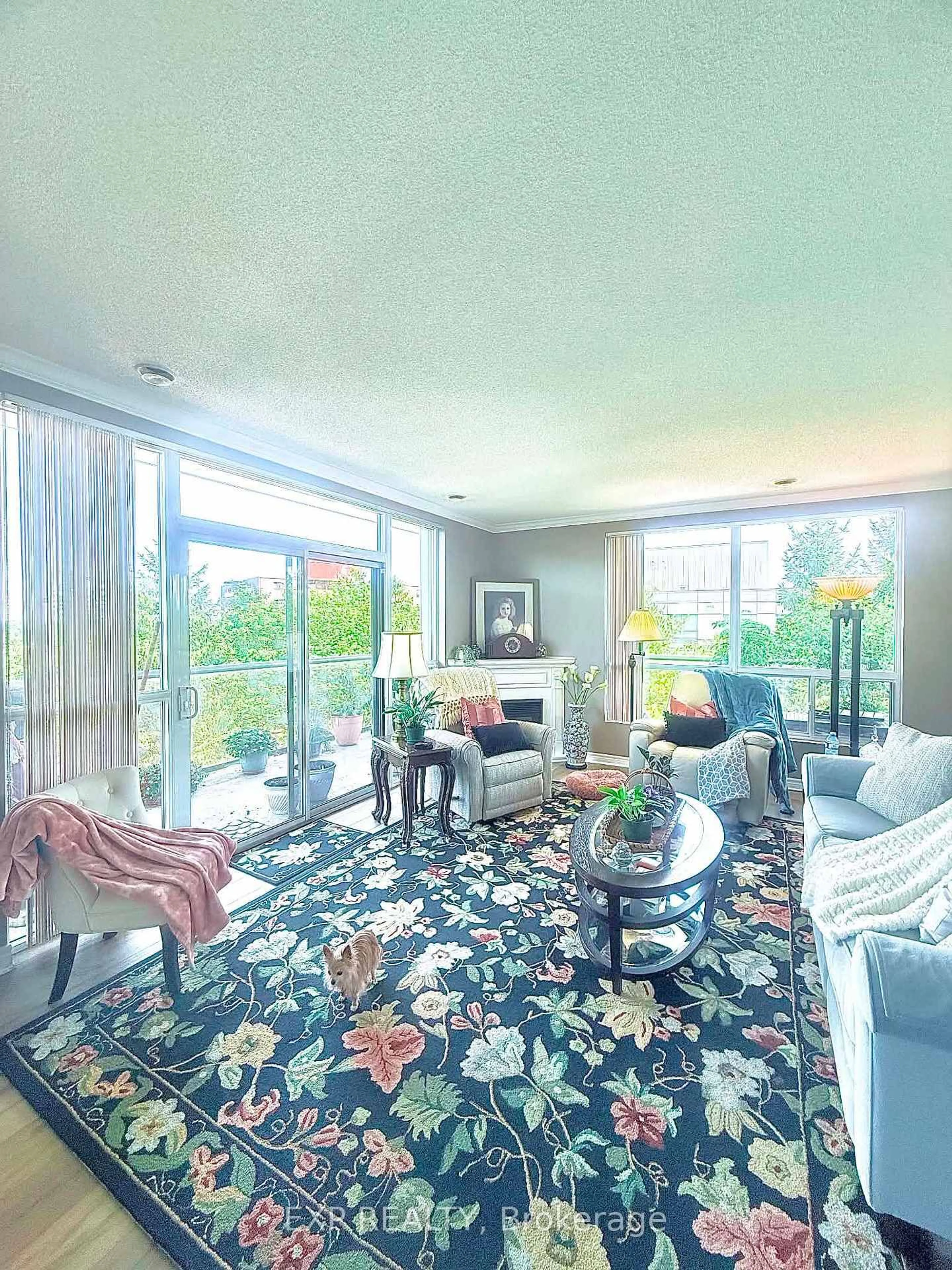 Living room with furniture, carpet floor for 353 Commissioners Rd #304, London South Ontario N6J 0A3