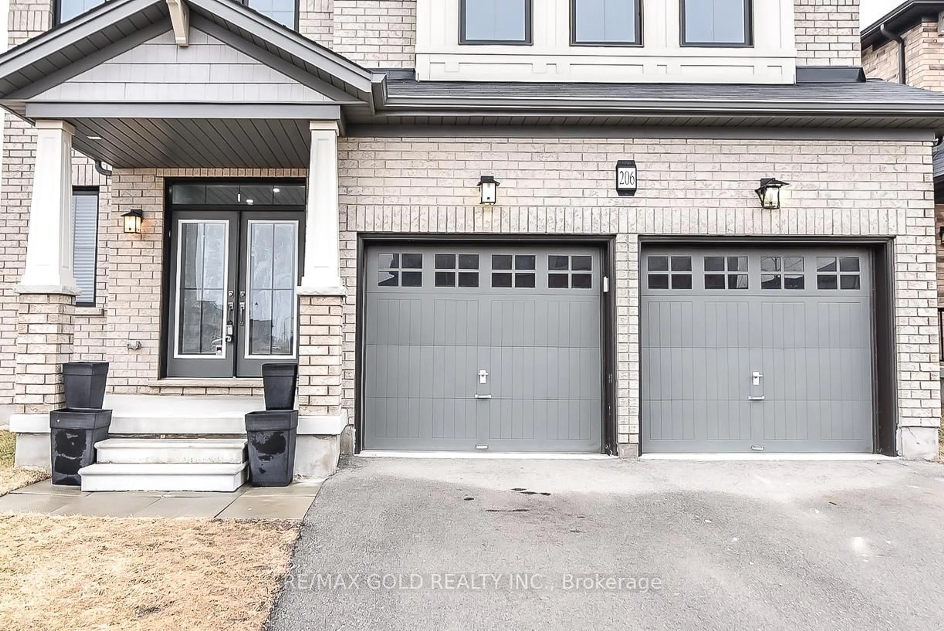 Home with brick exterior material, street for 206 Crafter Cres, Hamilton Ontario L8J 0J1