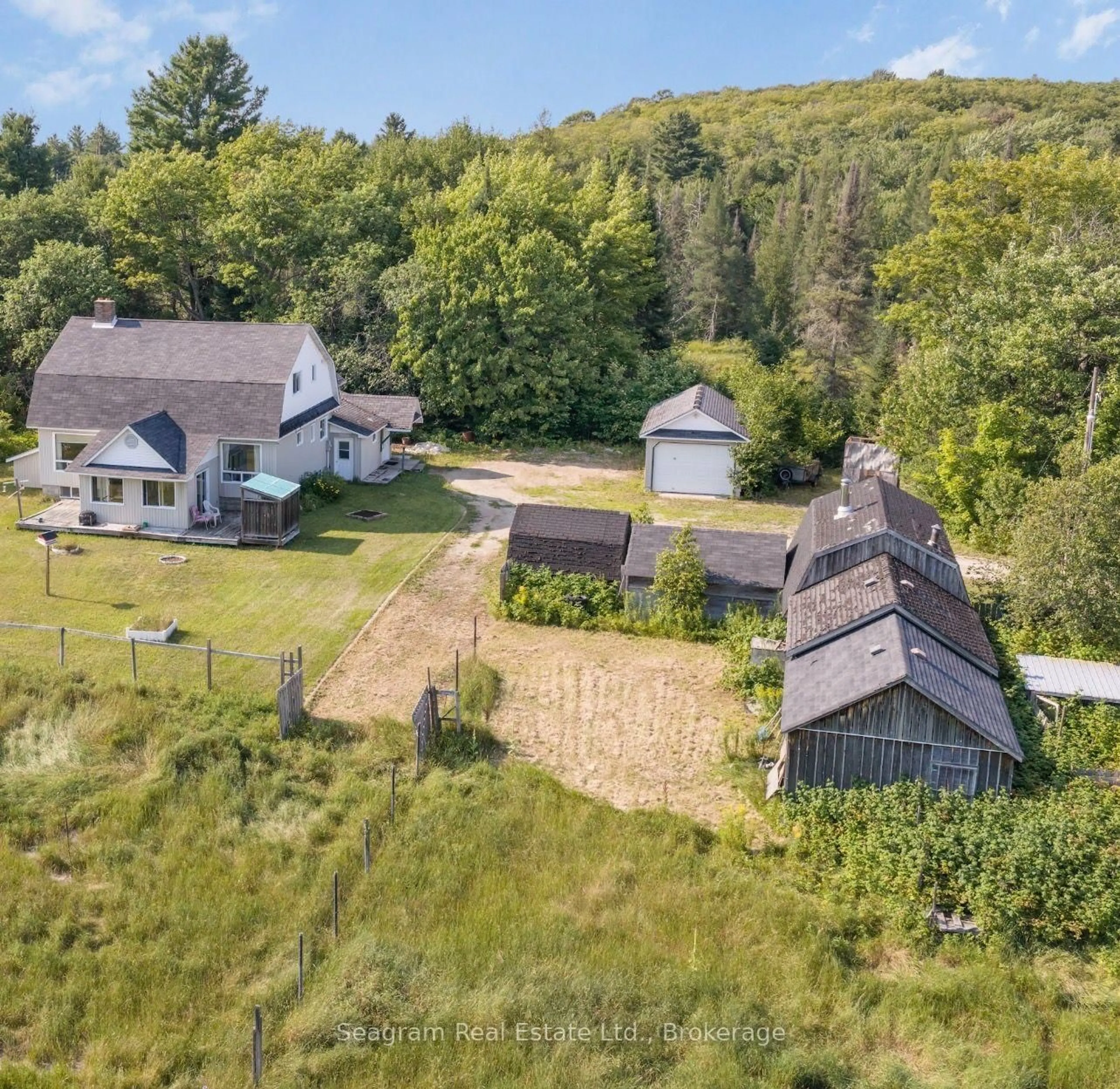A pic from outside/outdoor area/front of a property/back of a property/a pic from drone, mountain view for 1308 Albert St, Machar Ontario P0A 1X0
