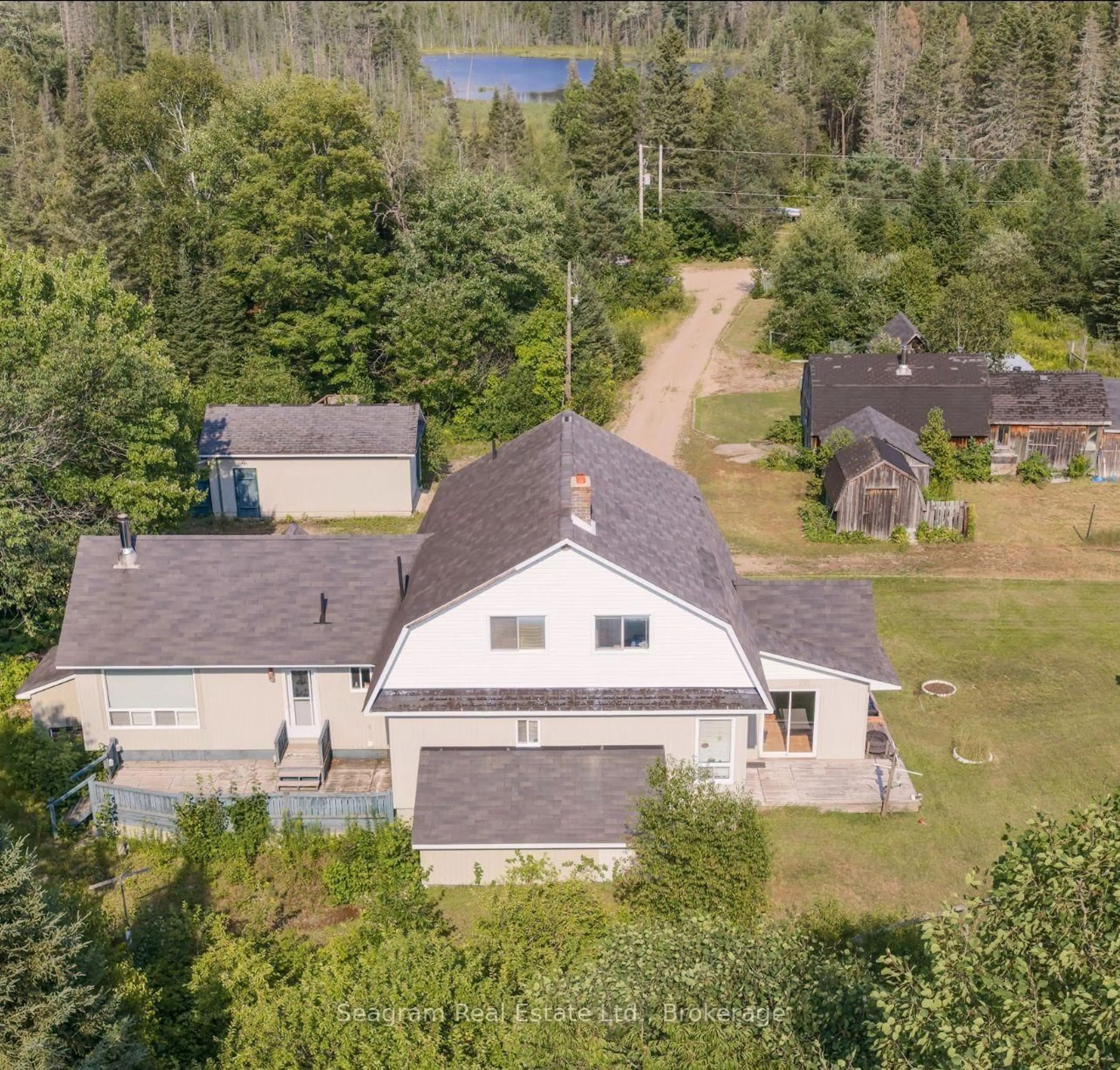 A pic from outside/outdoor area/front of a property/back of a property/a pic from drone, unknown for 1308 Albert St, Machar Ontario P0A 1X0