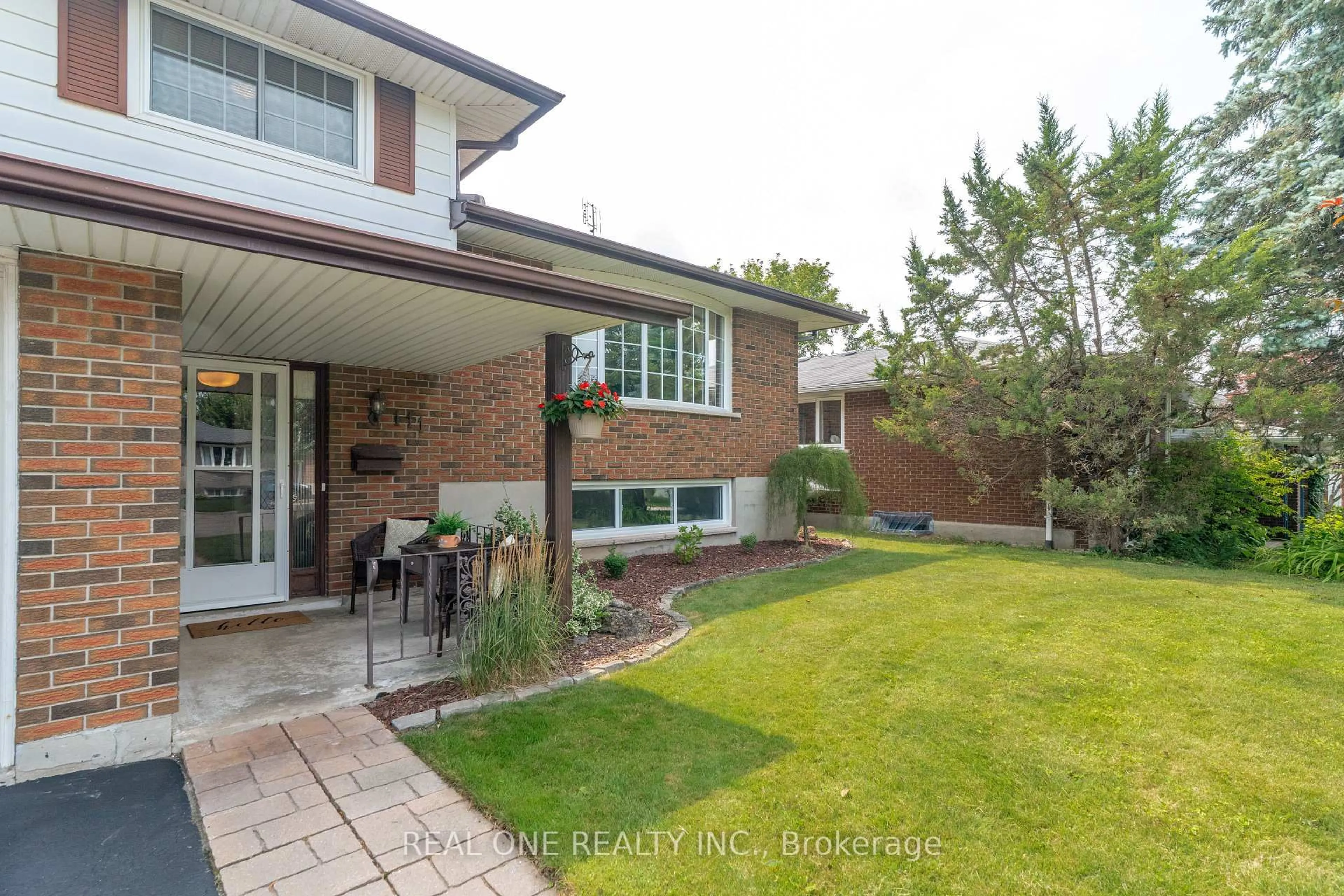Home with brick exterior material, street for 111 Glenburnie Dr, Guelph Ontario N1E 4C9