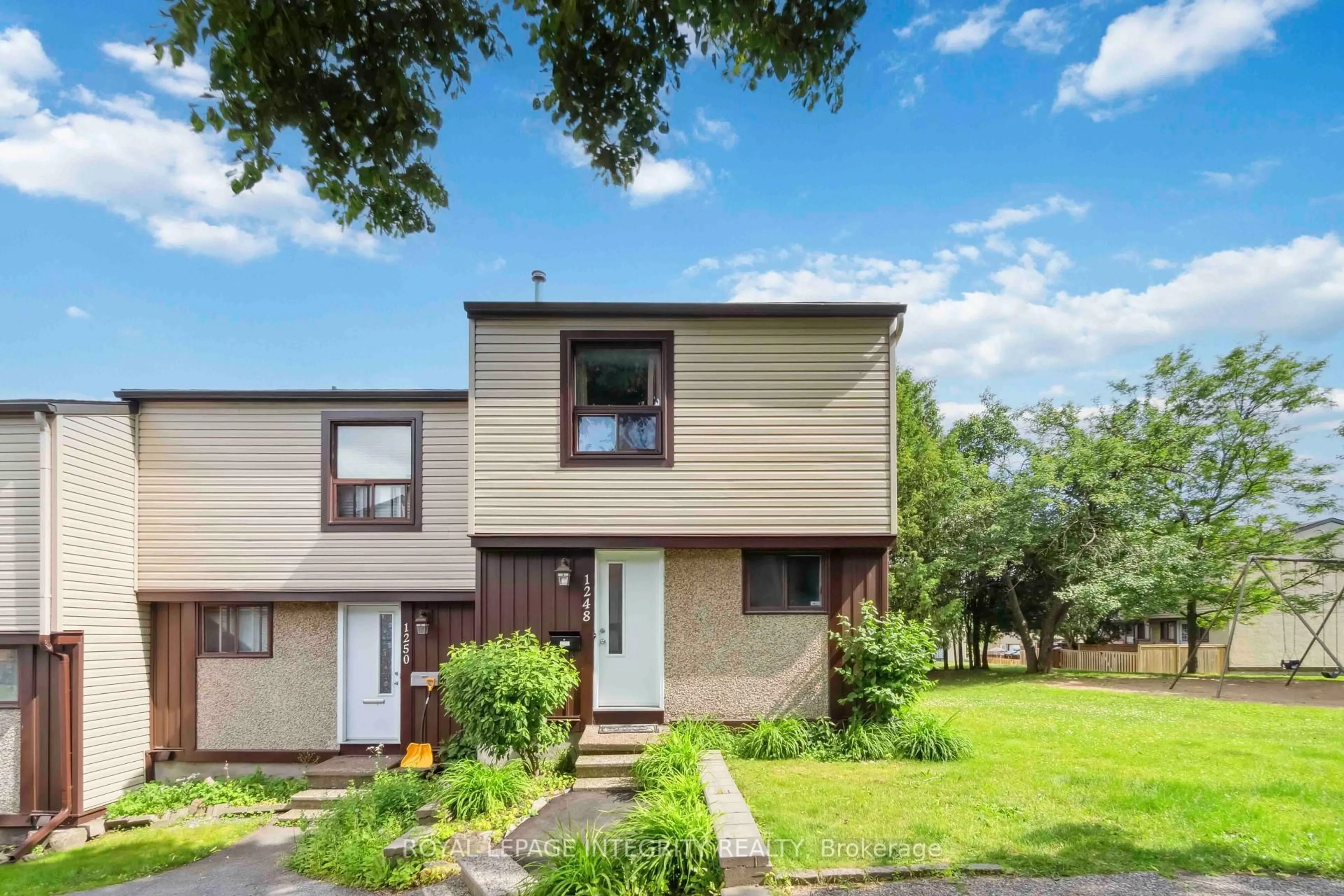 Home with vinyl exterior material, street for 1248 Bethamy Lane, Ottawa Ontario K1J 8P4