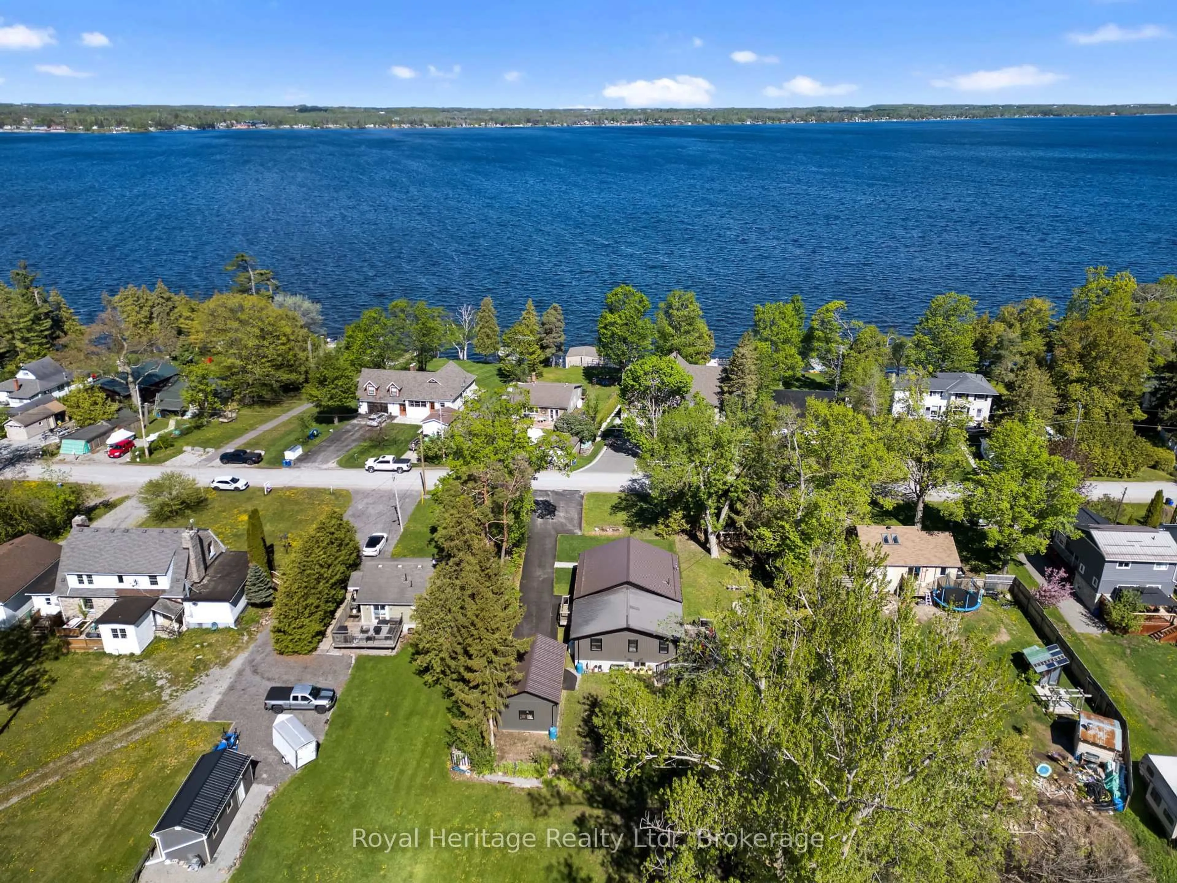 A pic from outside/outdoor area/front of a property/back of a property/a pic from drone, water/lake/river/ocean view for 35 Leslie Frost Lane, Kawartha Lakes Ontario K9V 4R6