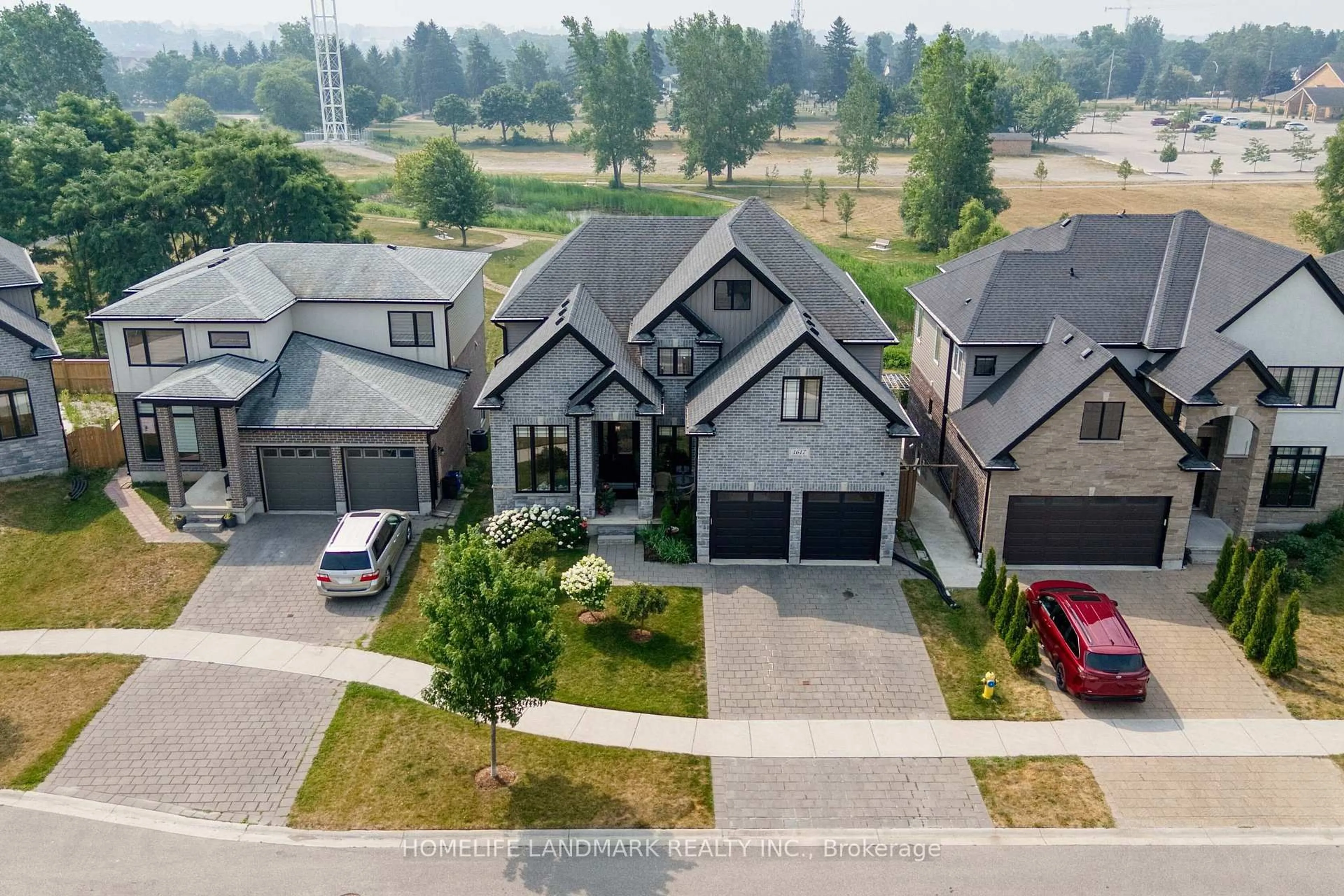 A pic from outside/outdoor area/front of a property/back of a property/a pic from drone, street for 1617 Sandridge Ave, London North Ontario N5X 0G5
