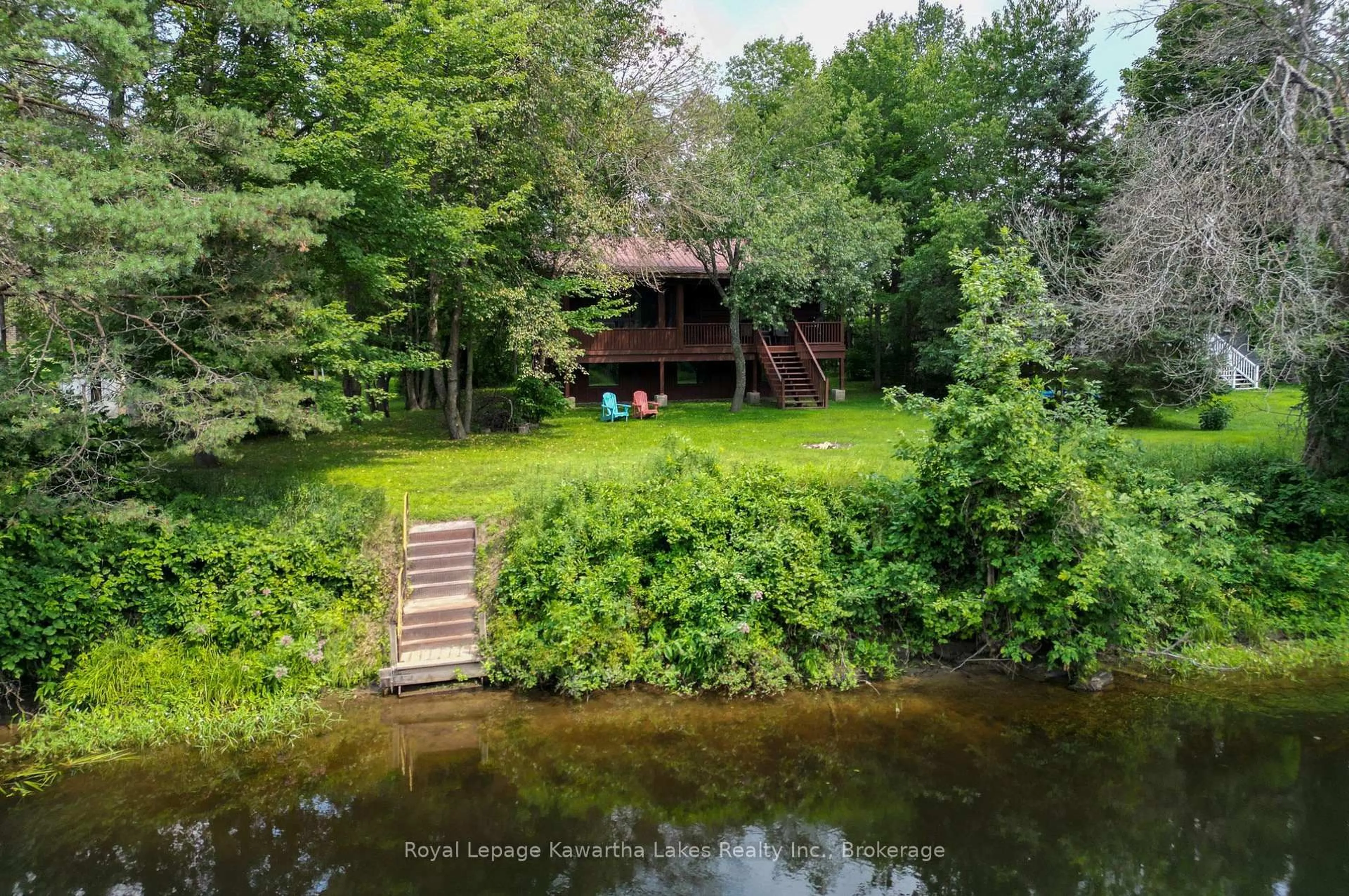 A pic from outside/outdoor area/front of a property/back of a property/a pic from drone, water/lake/river/ocean view for 9 Crooked Crt, Kawartha Lakes Ontario K0M 1N0
