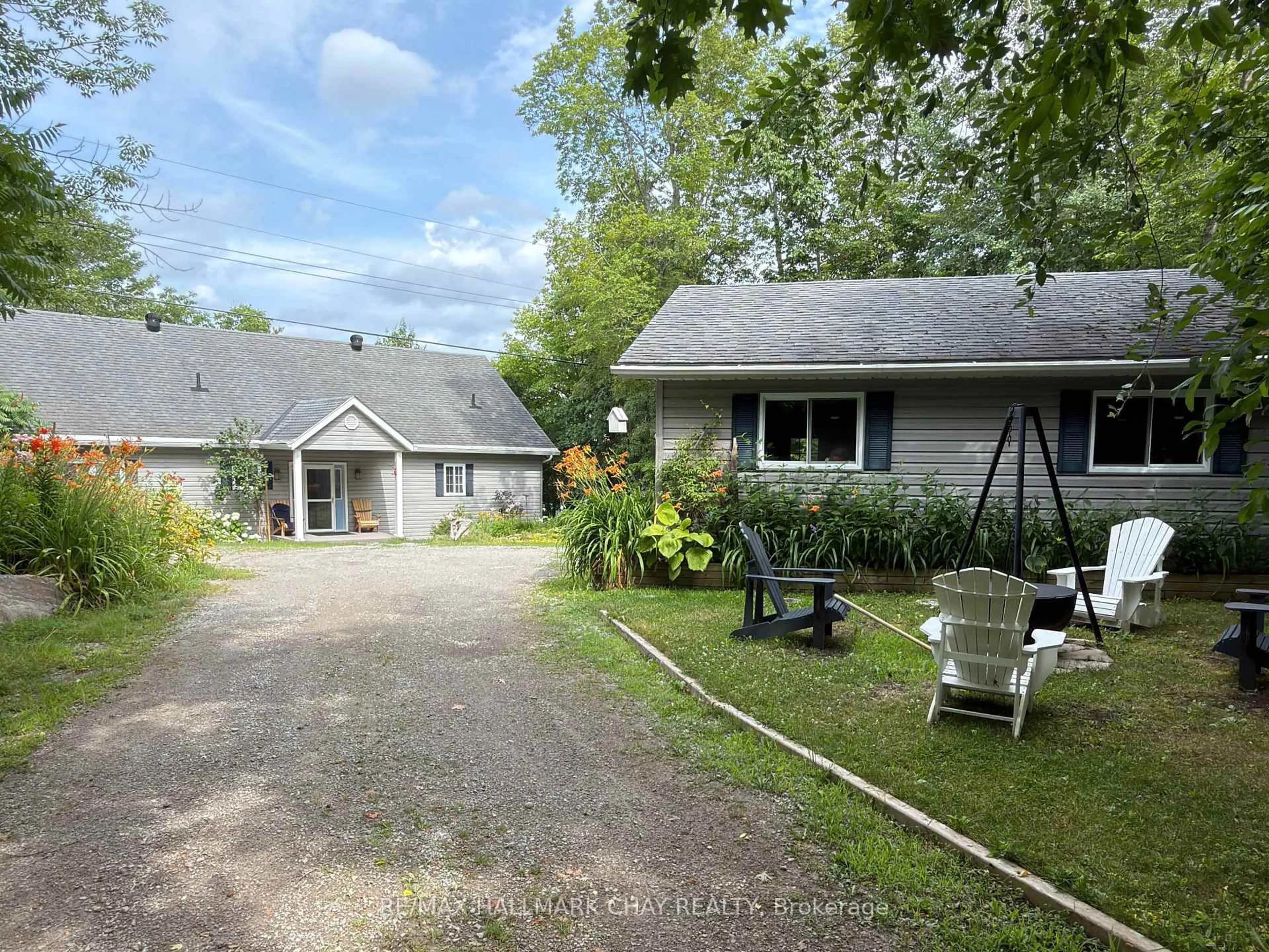A pic from outside/outdoor area/front of a property/back of a property/a pic from drone, unknown for 137 Pickerel Point Rd, Georgian Bay Ontario L0K 1S0