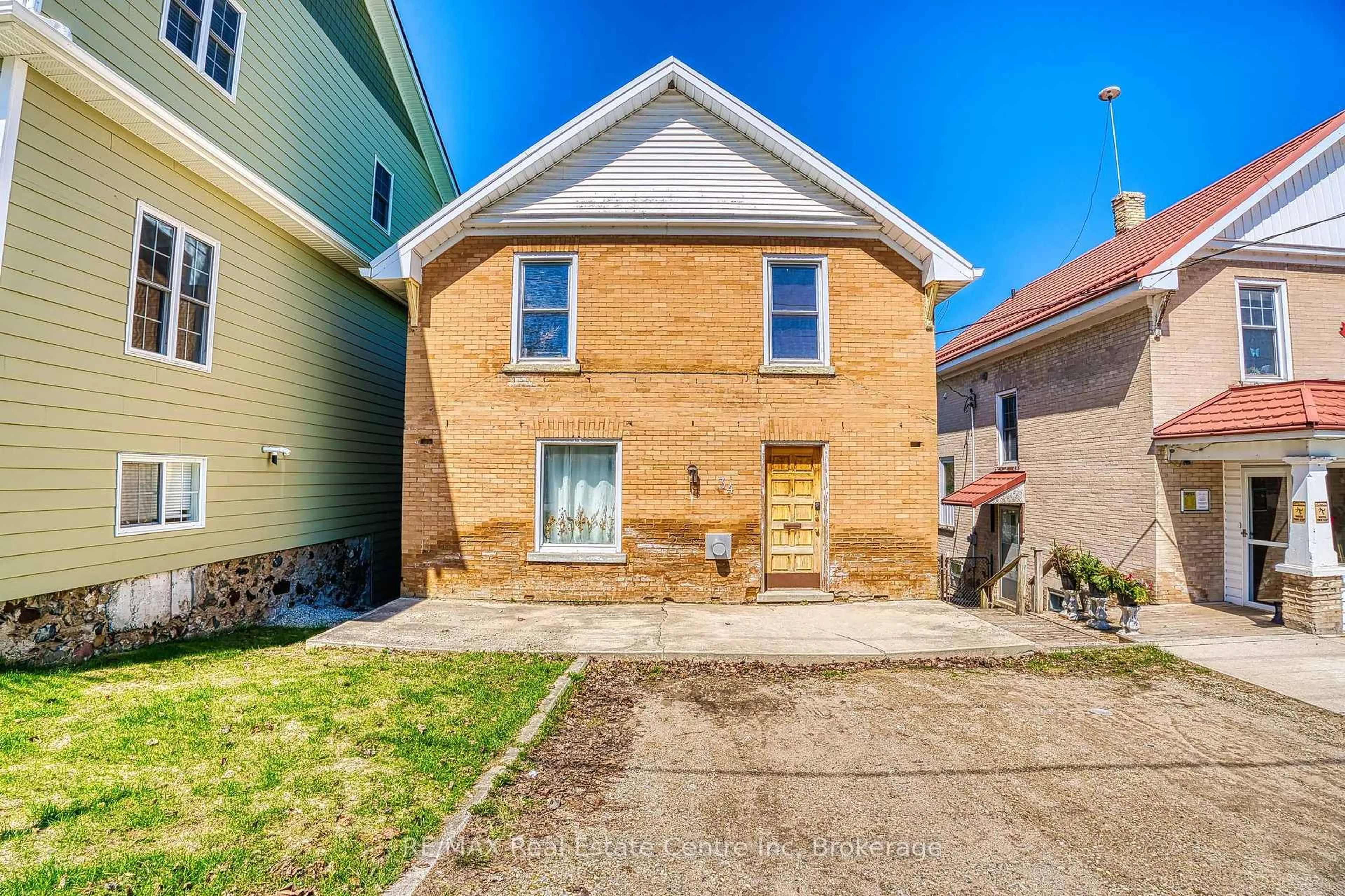 Home with brick exterior material, street for 34 Wellington St, Mapleton Ontario N0G 1P0