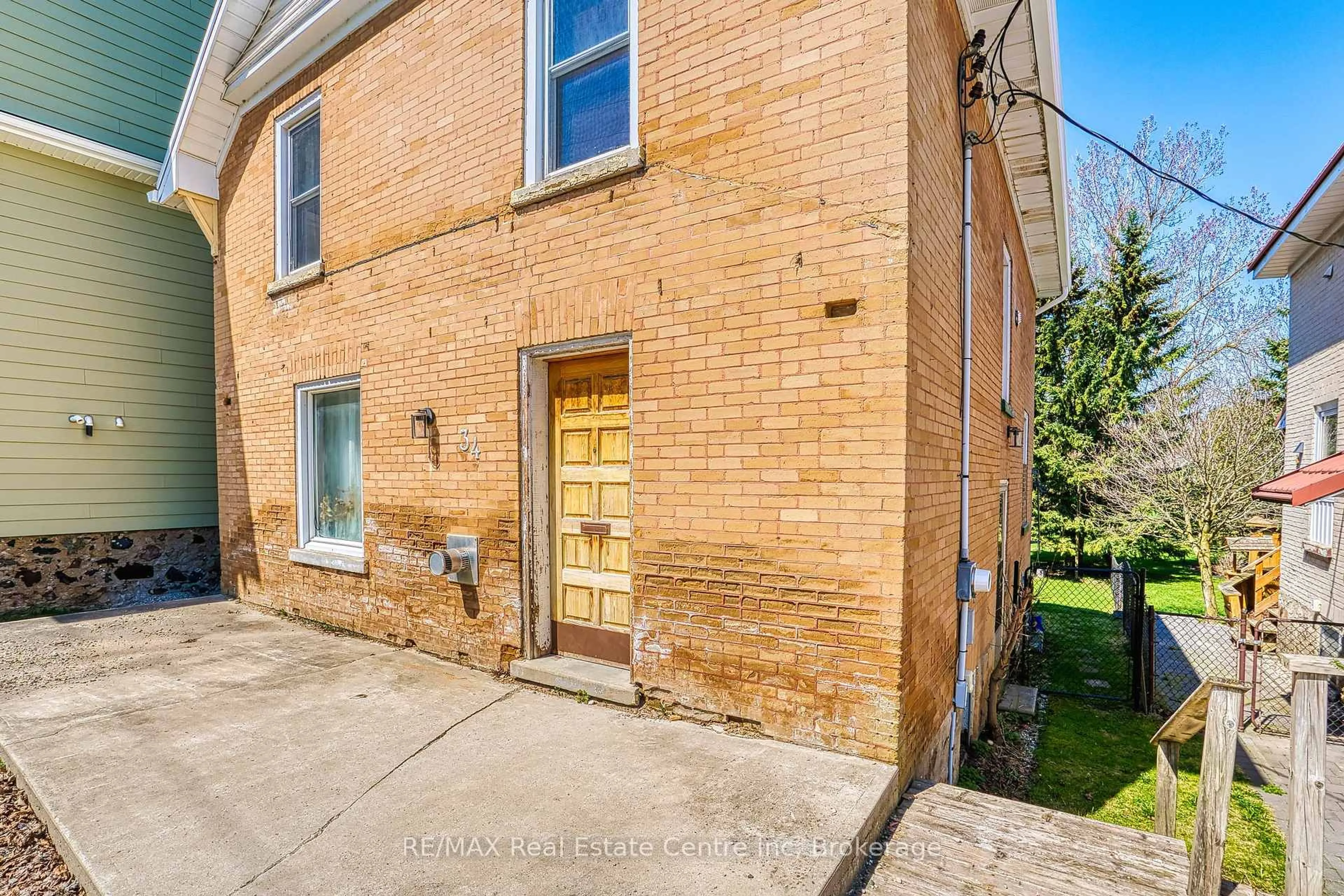 Home with brick exterior material, street for 34 Wellington St, Mapleton Ontario N0G 1P0