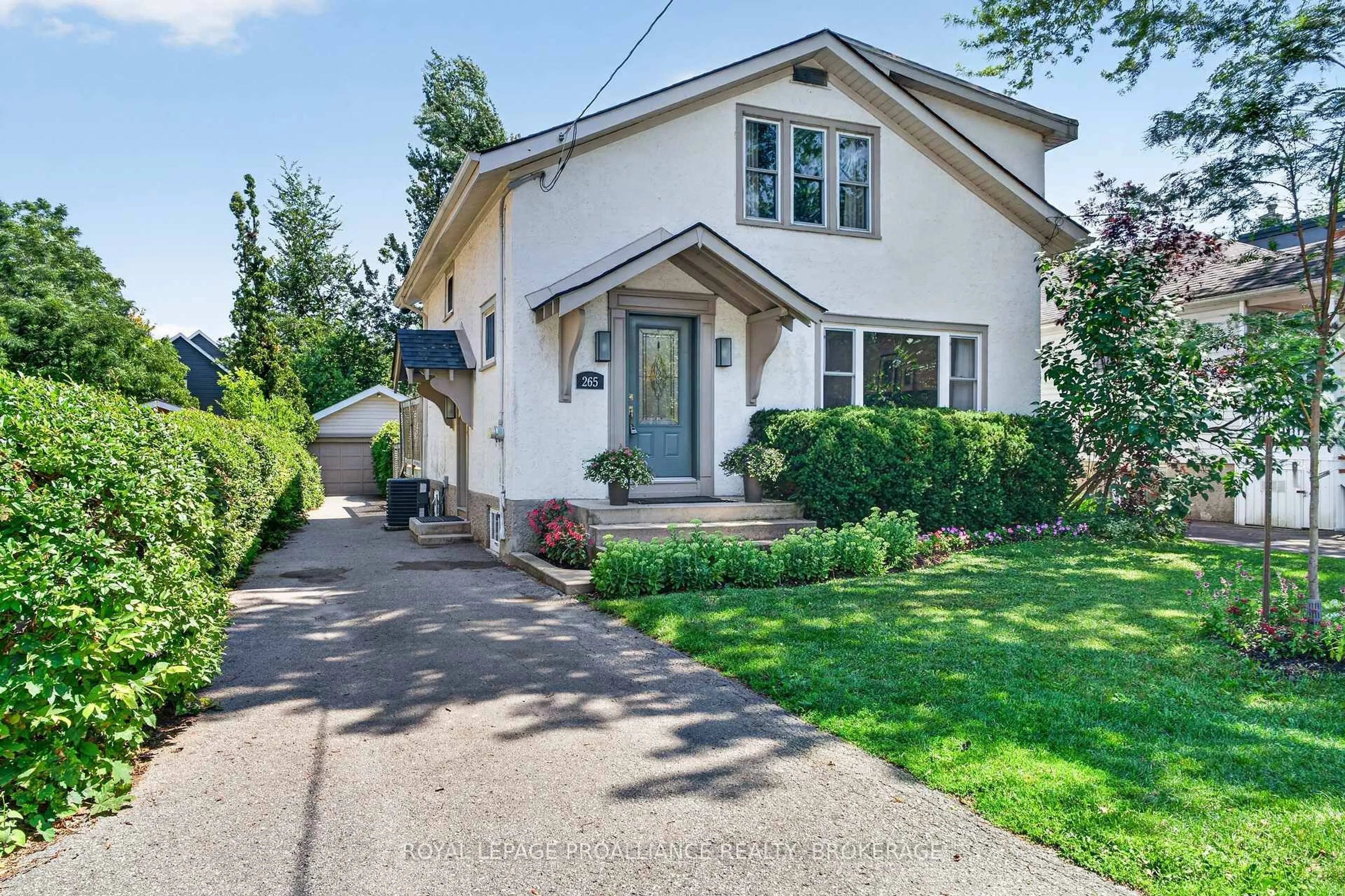 Home with vinyl exterior material, street for 265 College St, Kingston Ontario K7L 4M1