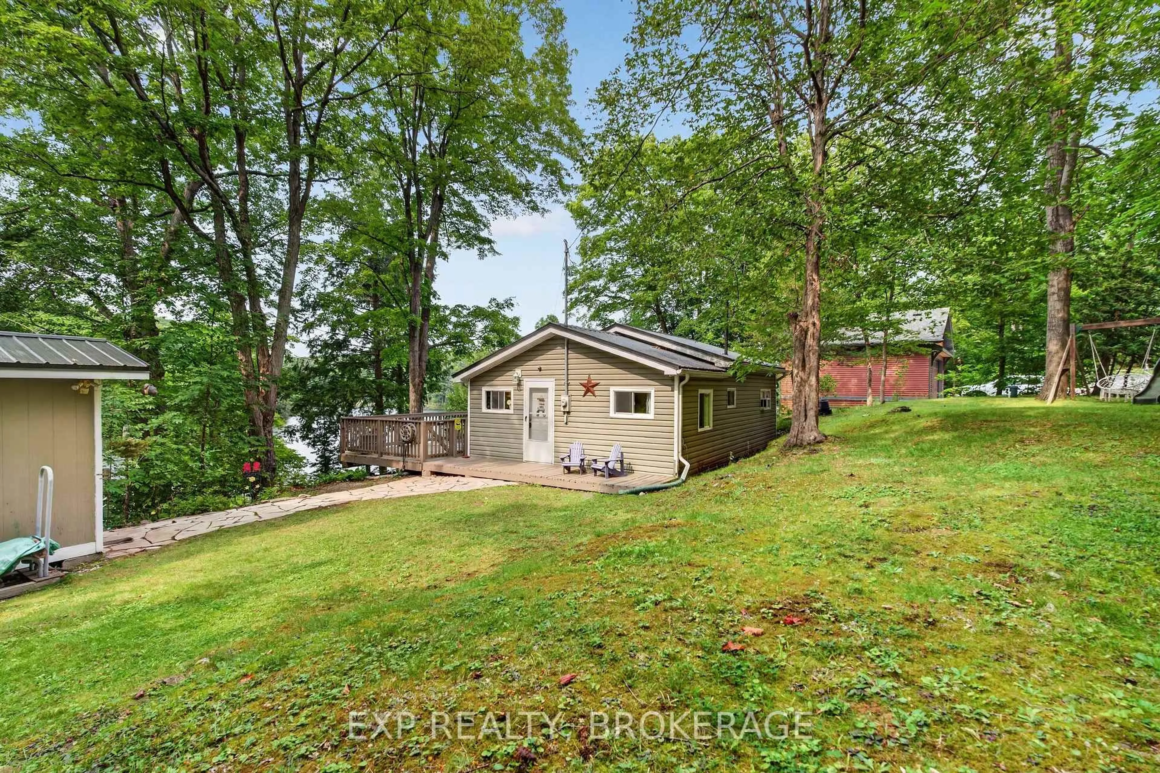 A pic from outside/outdoor area/front of a property/back of a property/a pic from drone, water/lake/river/ocean view for 5505 RIDEAU Rd, Seeley's Bay Ontario K0H 2N0