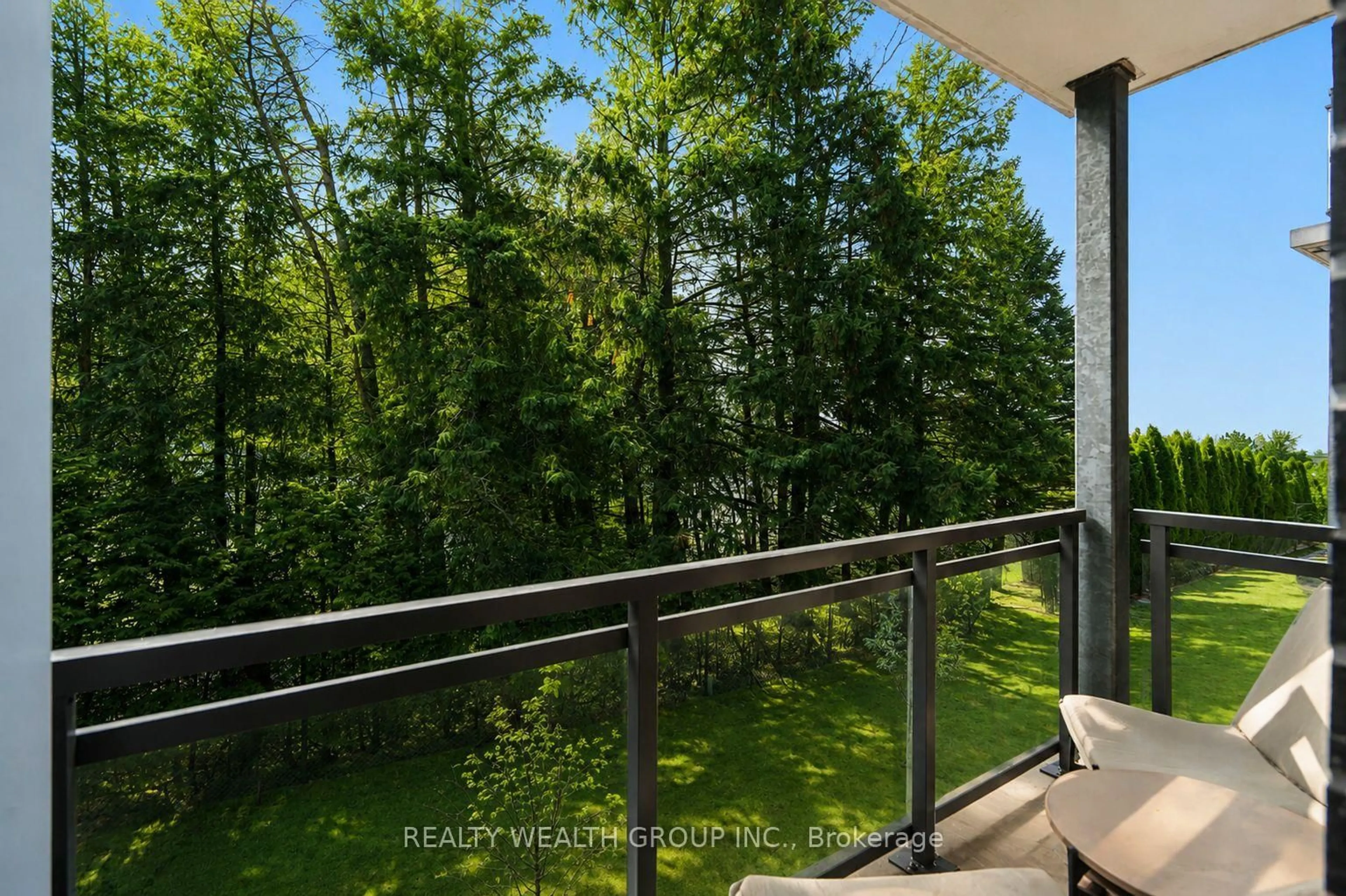 Balcony in the apartment, forest/trees view for 1201 Lackner Pl #308, Kitchener Ontario N2A 0L4