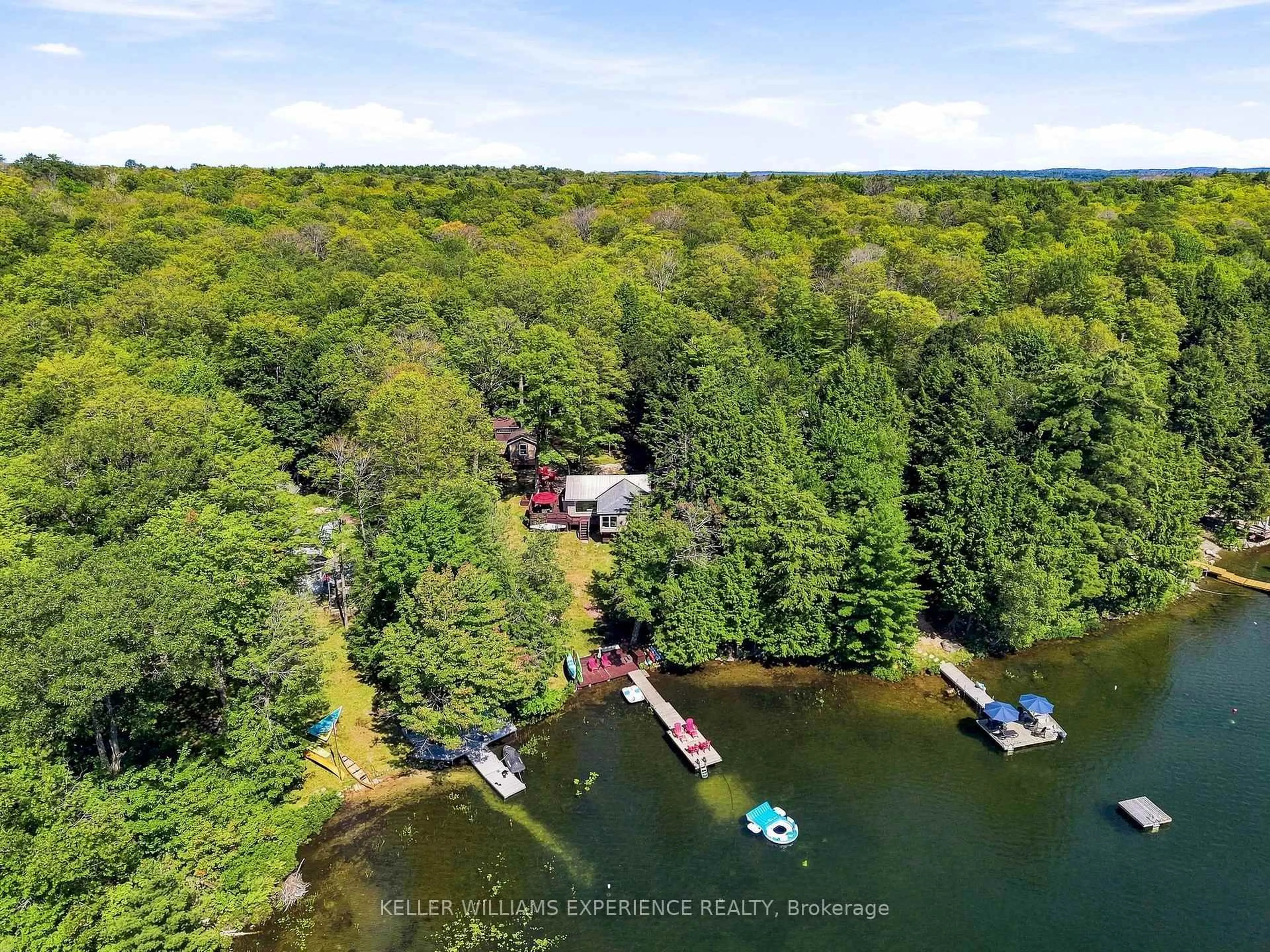 A pic from outside/outdoor area/front of a property/back of a property/a pic from drone, water/lake/river/ocean view for 548 Silver Lake Rd, Magnetawan Ontario P0A 1P0