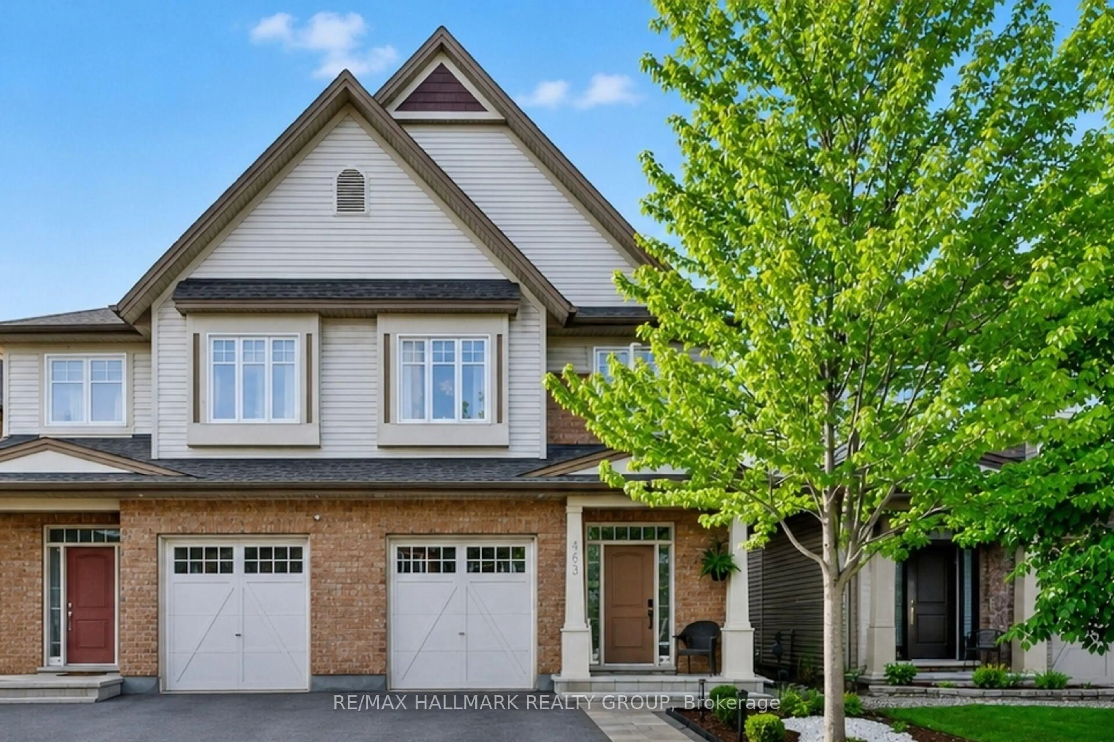 Home with brick exterior material, street for 163 Highbury Park Dr, Ottawa Ontario K2J 5Y1