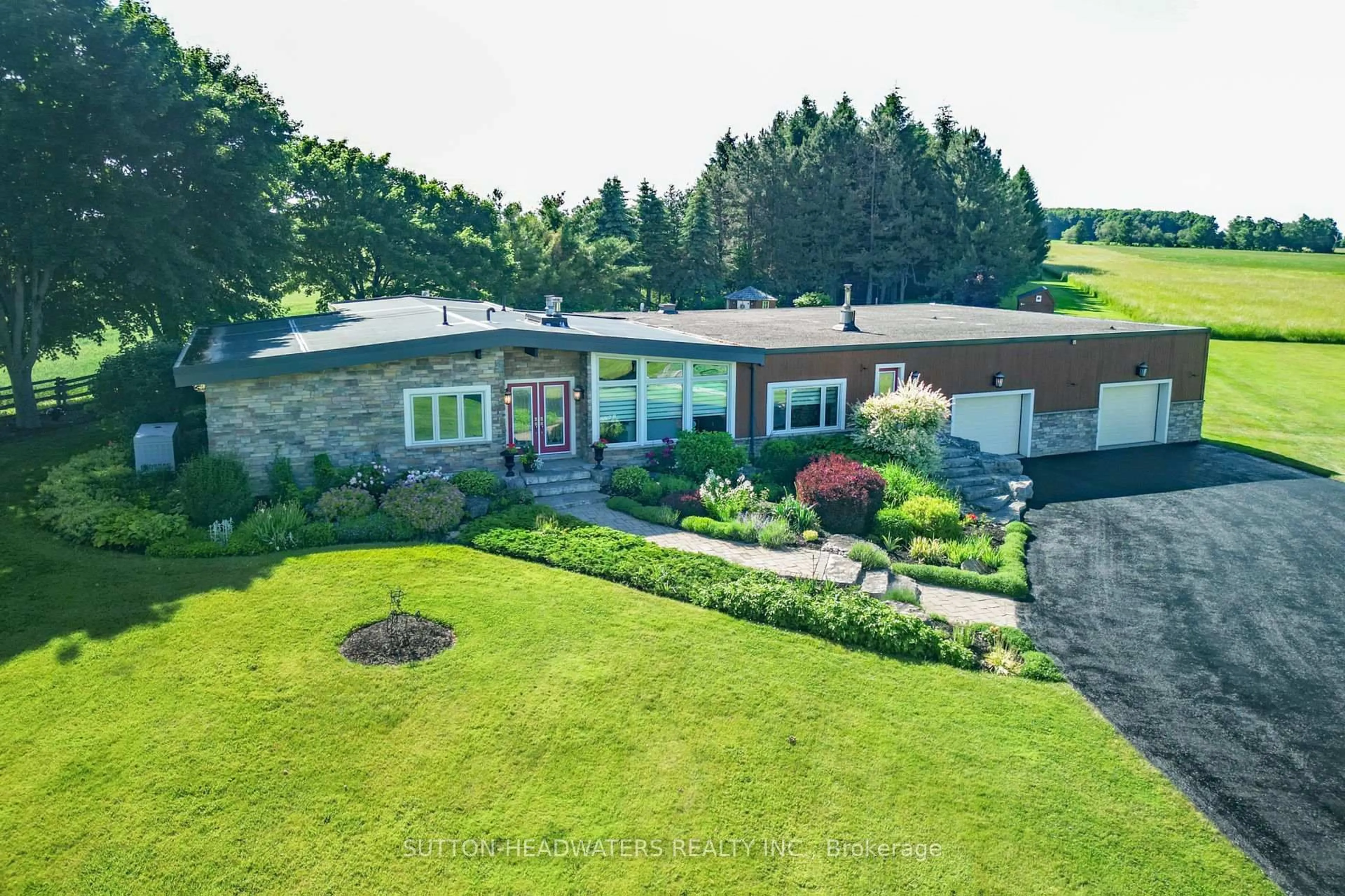 A pic from outside/outdoor area/front of a property/back of a property/a pic from drone, unknown for 064349 County Rd 3, East Garafraxa Ontario L9W 7J5