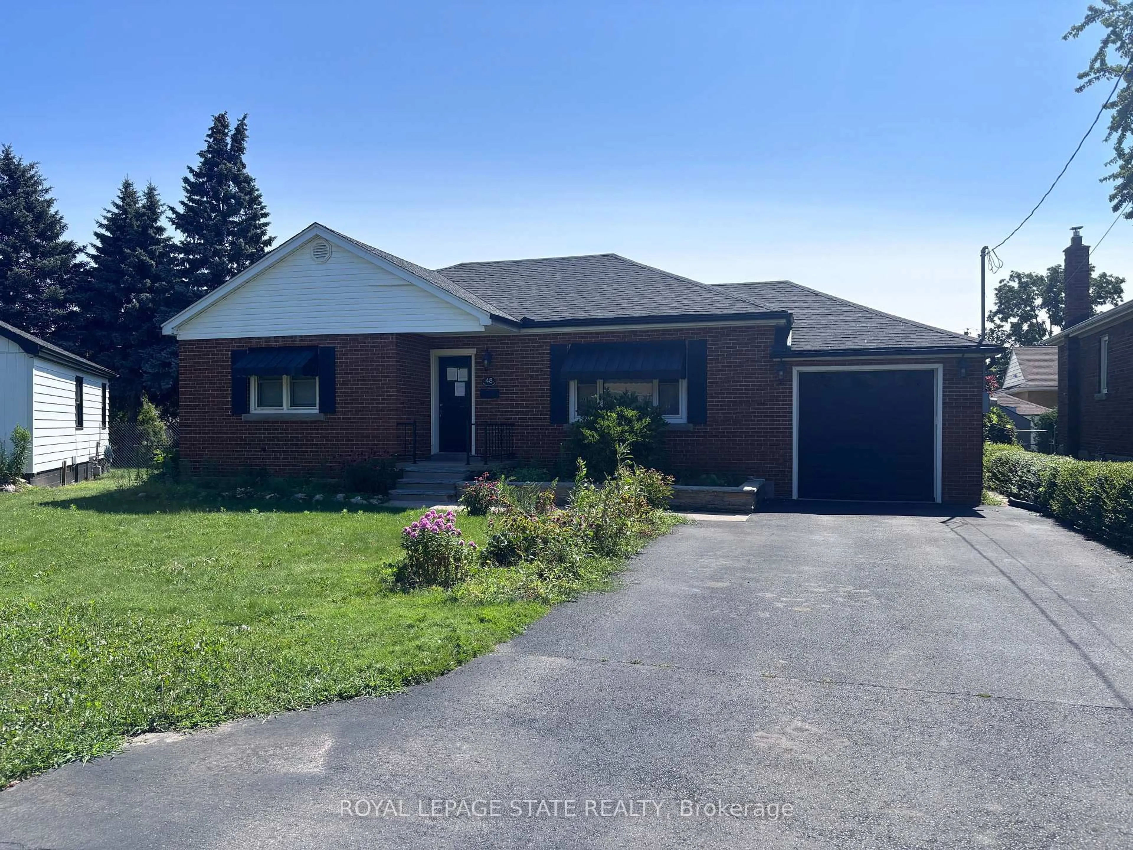 Home with brick exterior material, street for 48 Mountain Ave, Hamilton Ontario L8G 3N9