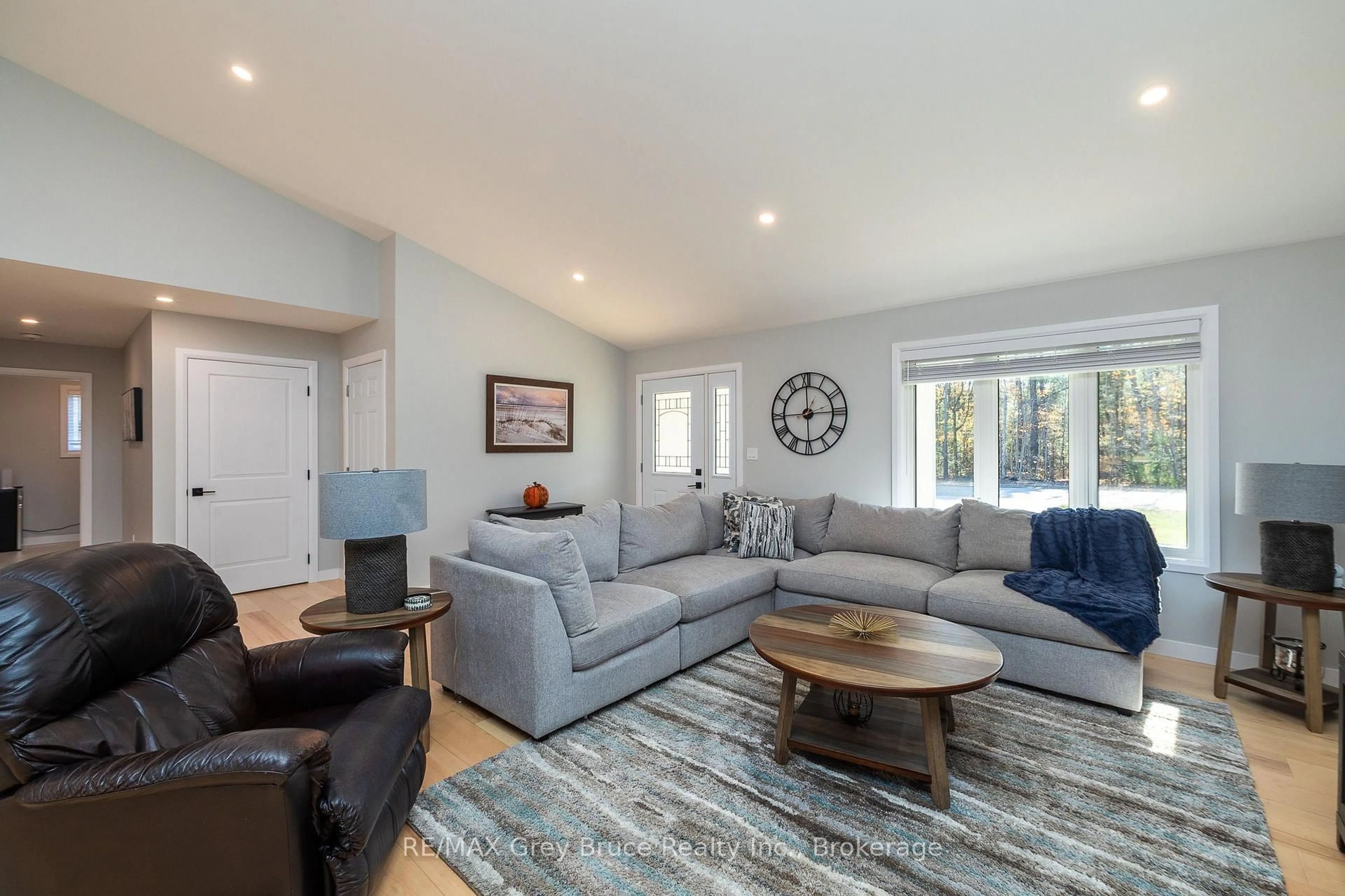 Living room with furniture, wood/laminate floor for 611 Sixth St, South Bruce Peninsula Ontario N0H 2G0