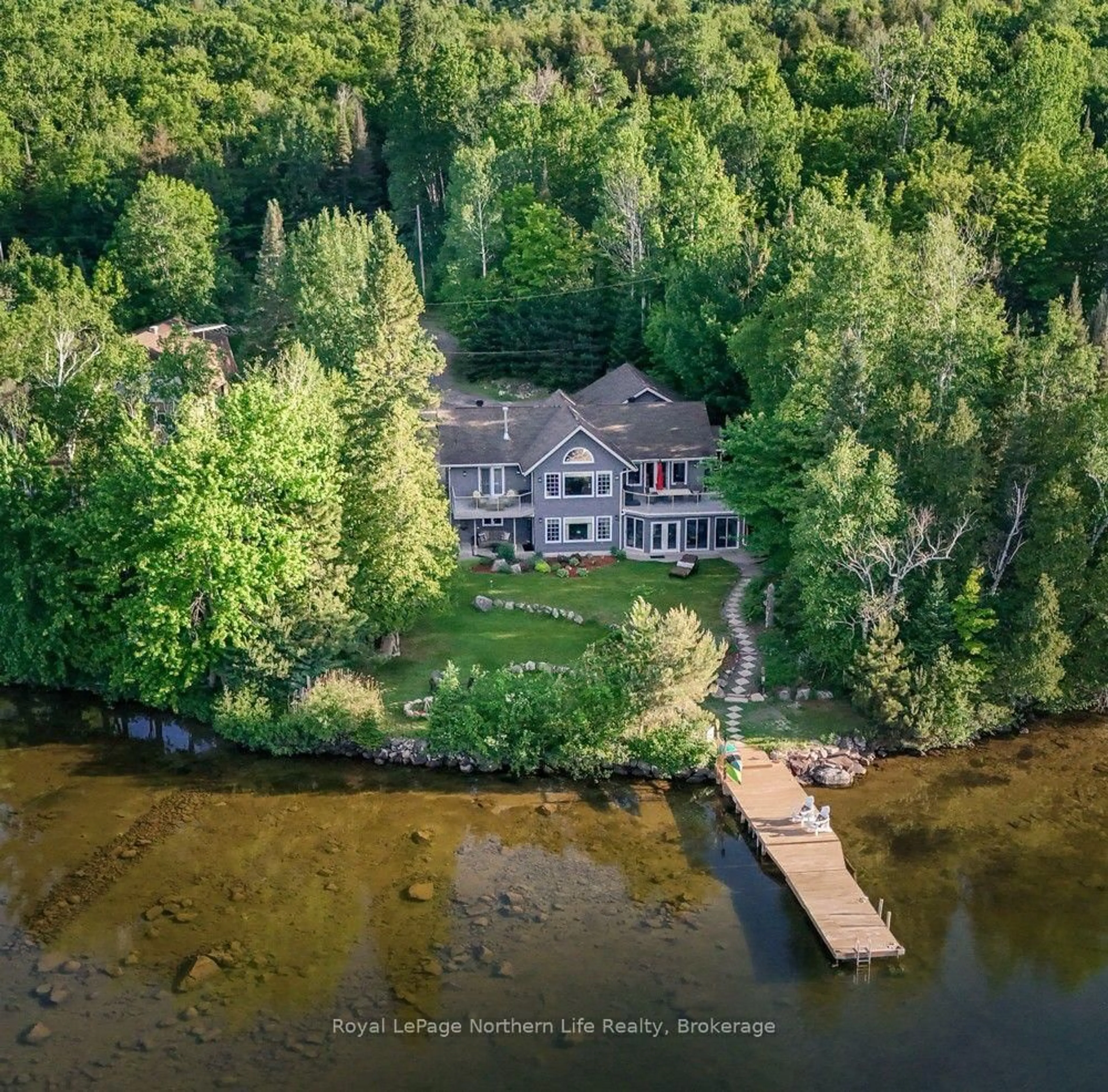 A pic from outside/outdoor area/front of a property/back of a property/a pic from drone, water/lake/river/ocean view for 571 D REGAL Rd, North Bay Ontario P1B 8G4