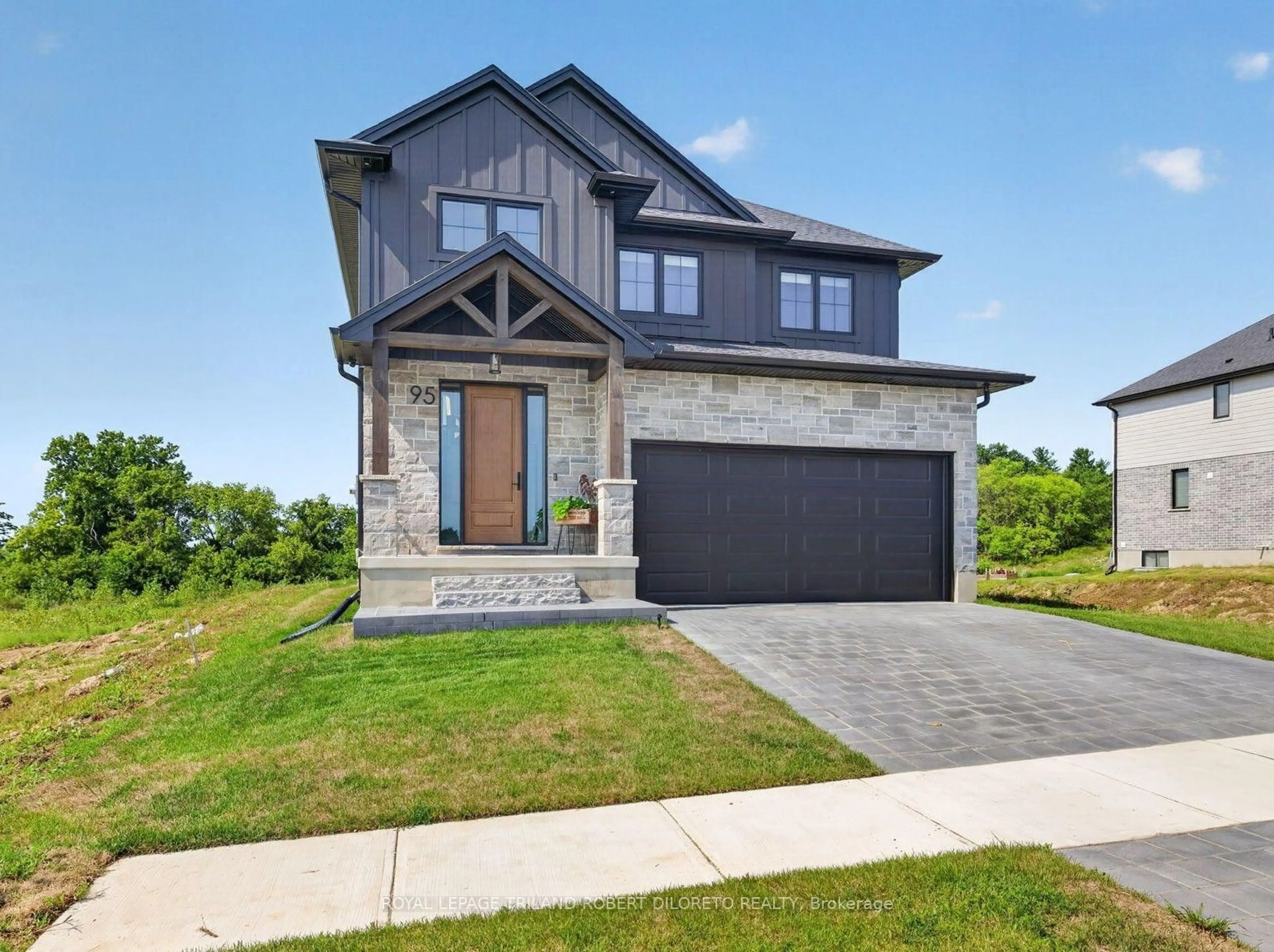Home with brick exterior material, street for 95 Allister Dr, Middlesex Centre Ontario N0L 1R0