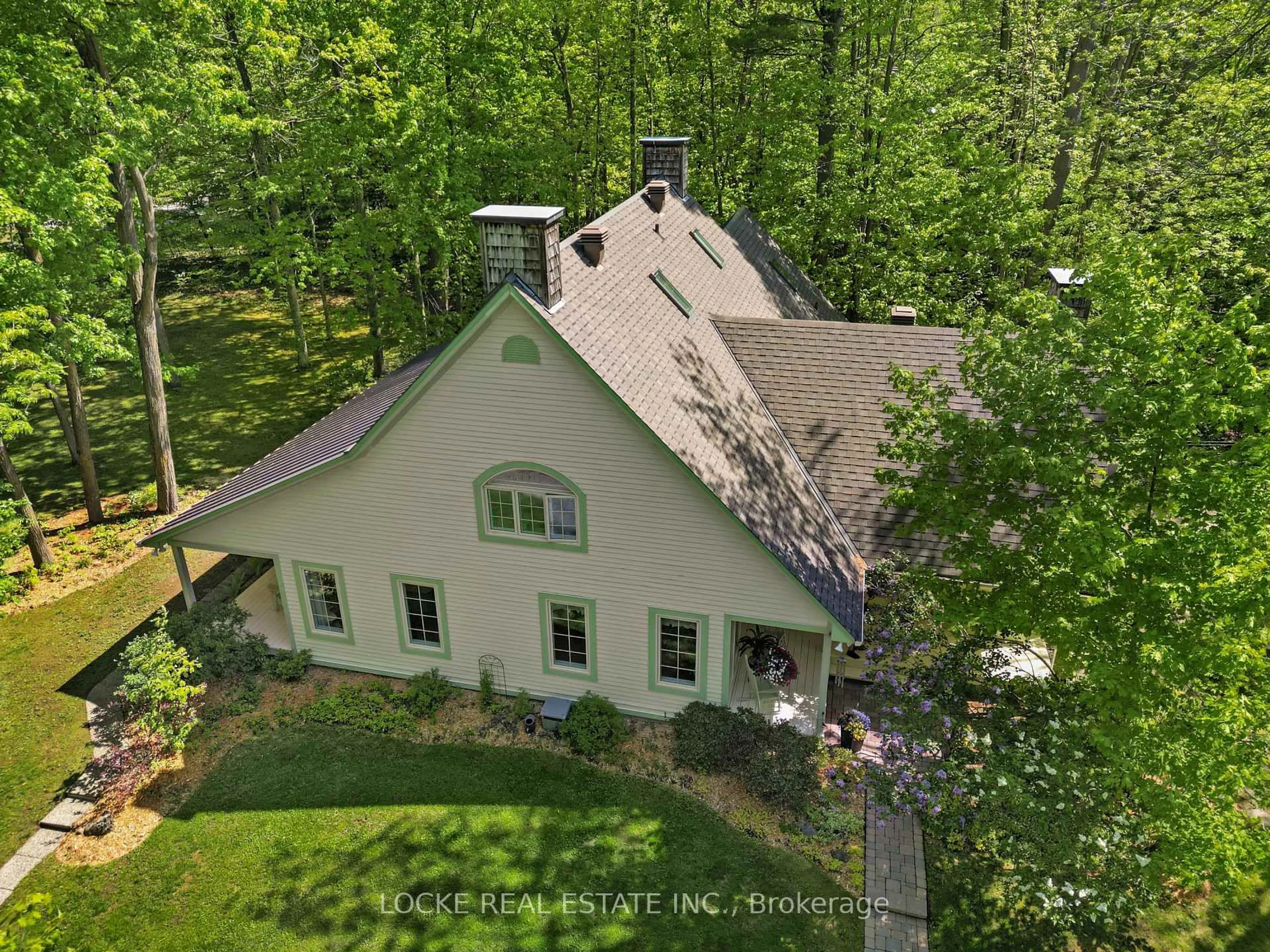 A pic from outside/outdoor area/front of a property/back of a property/a pic from drone, forest/trees view for 2207 Pleasantview Crt, Orleans Ontario K4C 1H7
