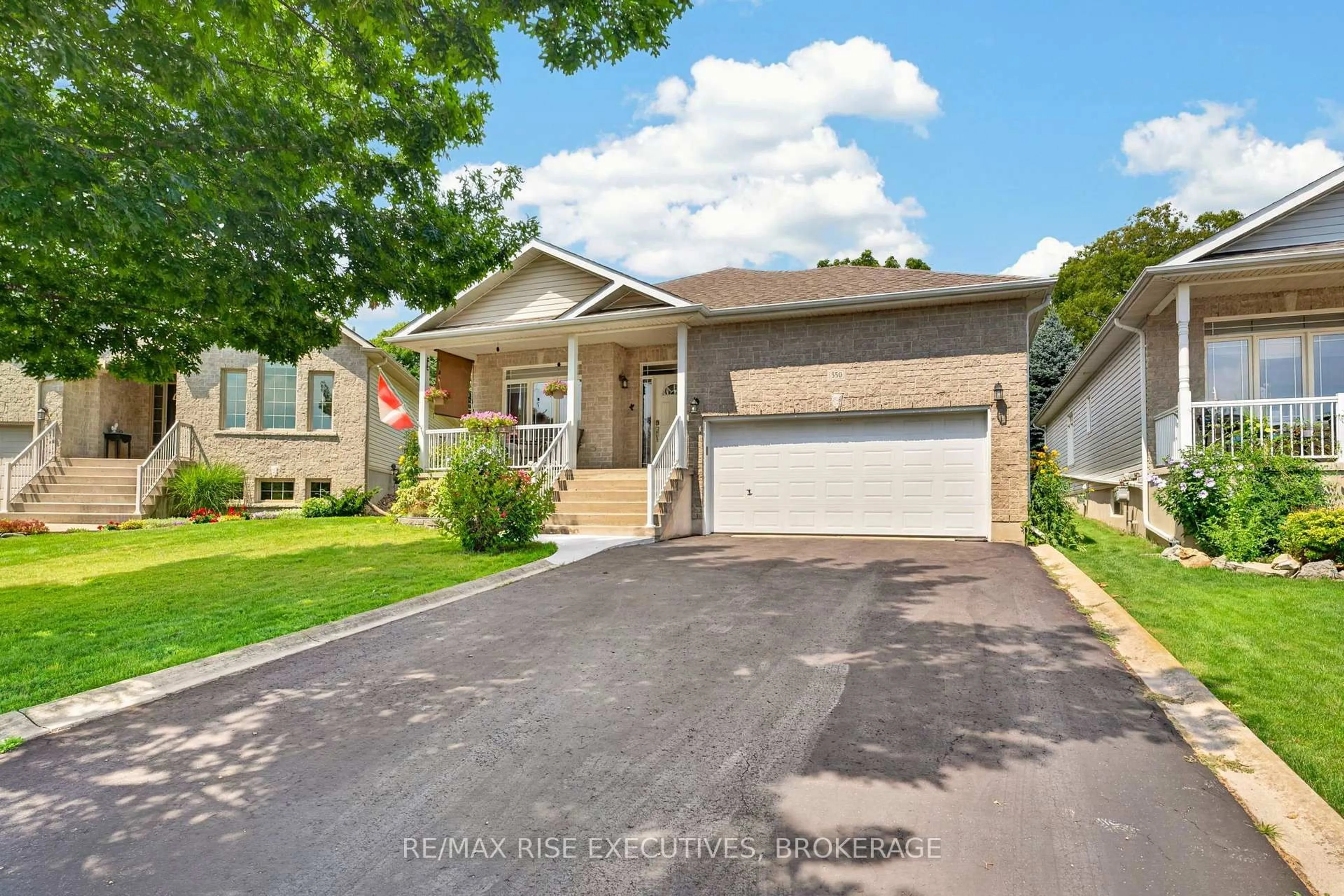 Home with vinyl exterior material, street for 550 Weston Cres, Kingston Ontario K7M 9E9