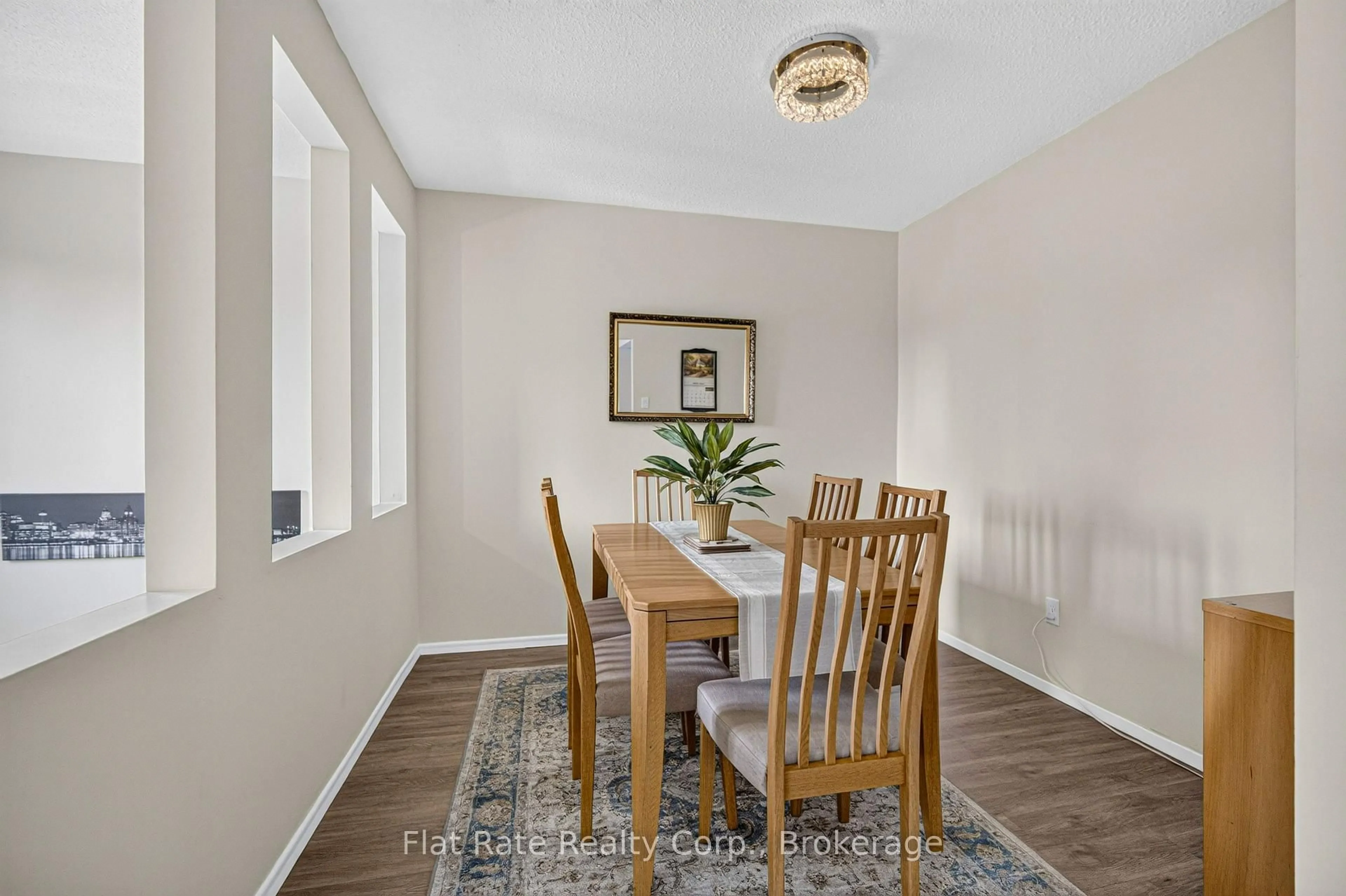 Dining room, wood/laminate floor for 1990 WALKER Ave, Peterborough Ontario K9L 1T5