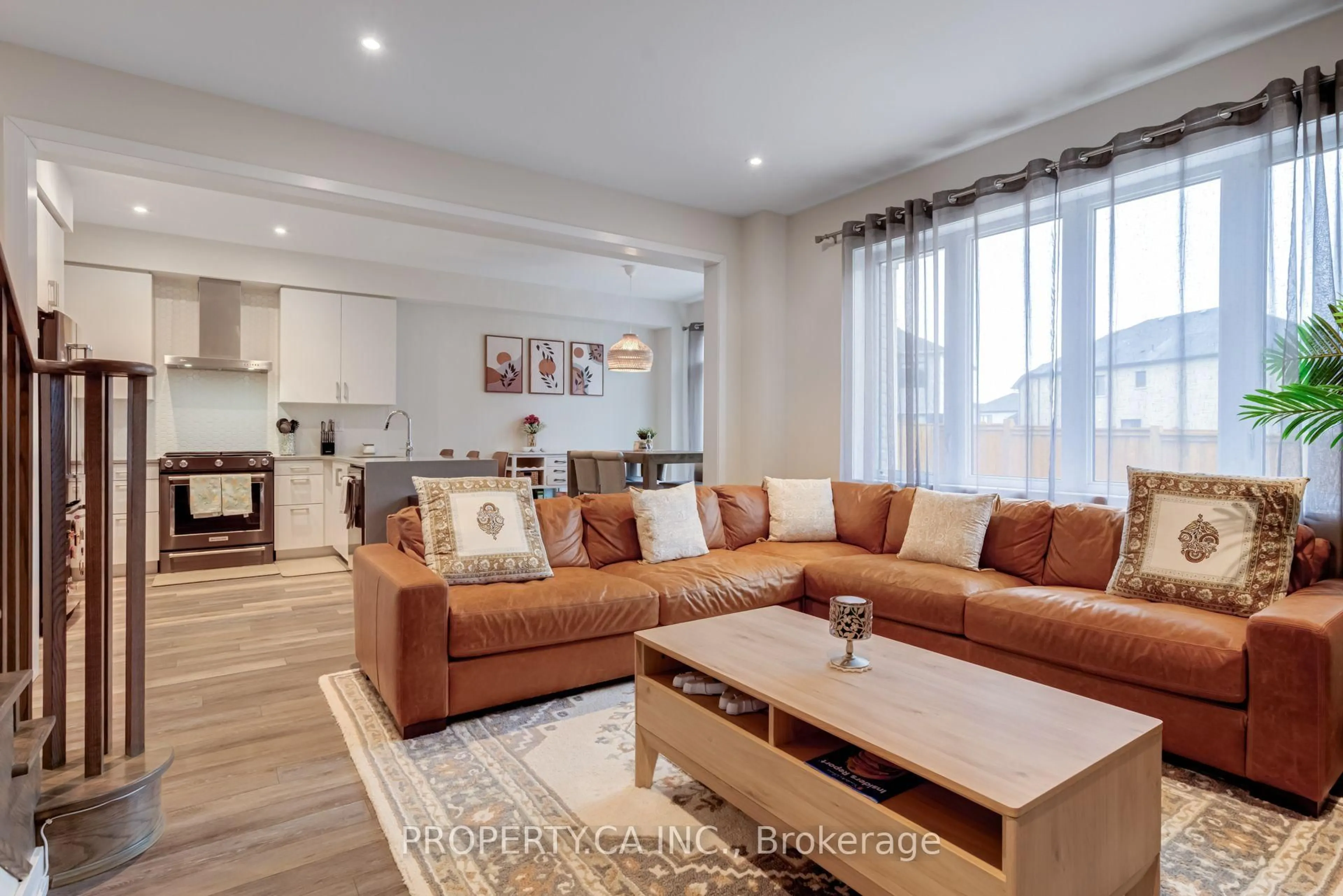Living room with furniture, wood/laminate floor for 176 Whithorn Cres, Haldimand Ontario N3W 0G7