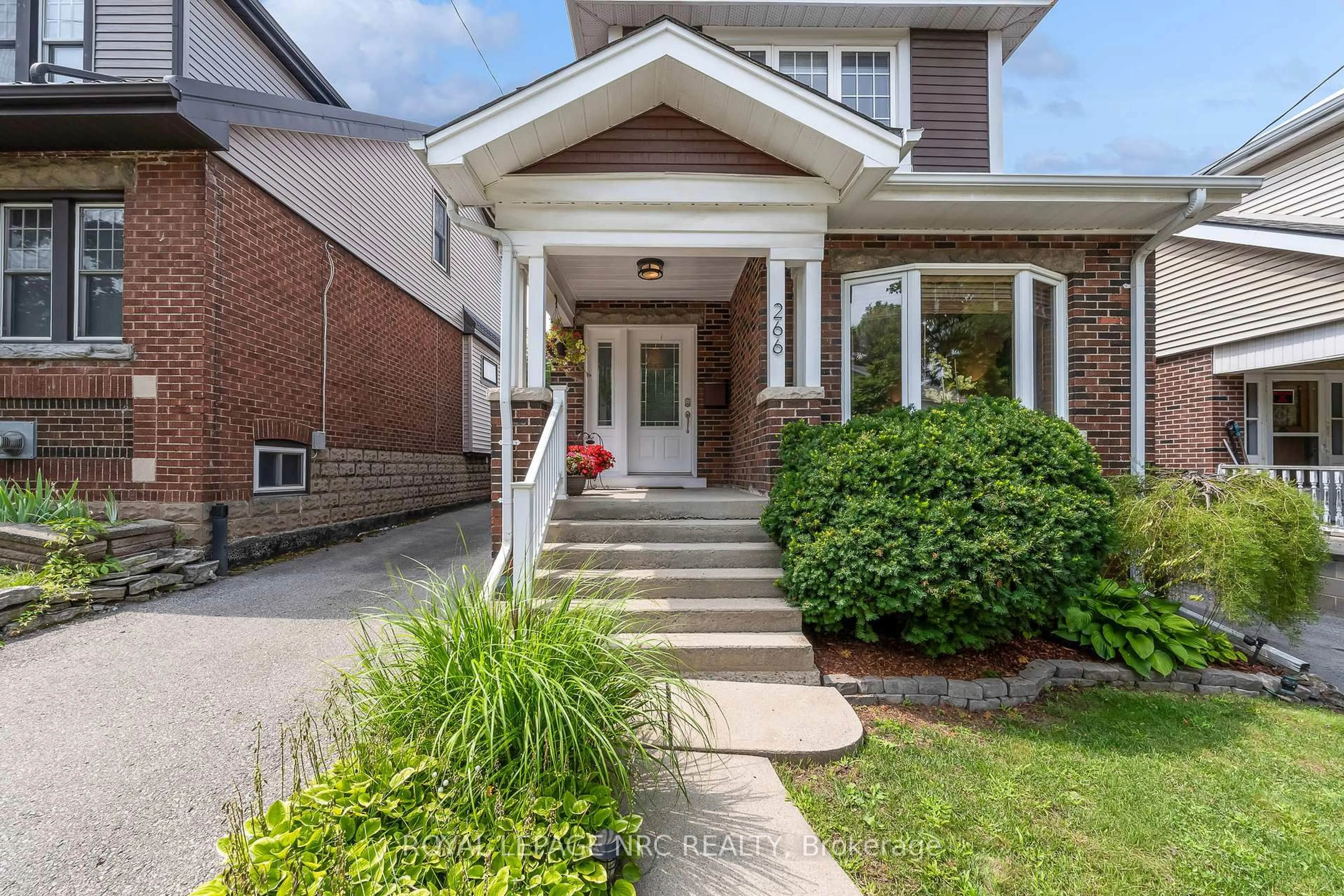 Home with brick exterior material, street for 266 London St, Hamilton Ontario L8K 2H2