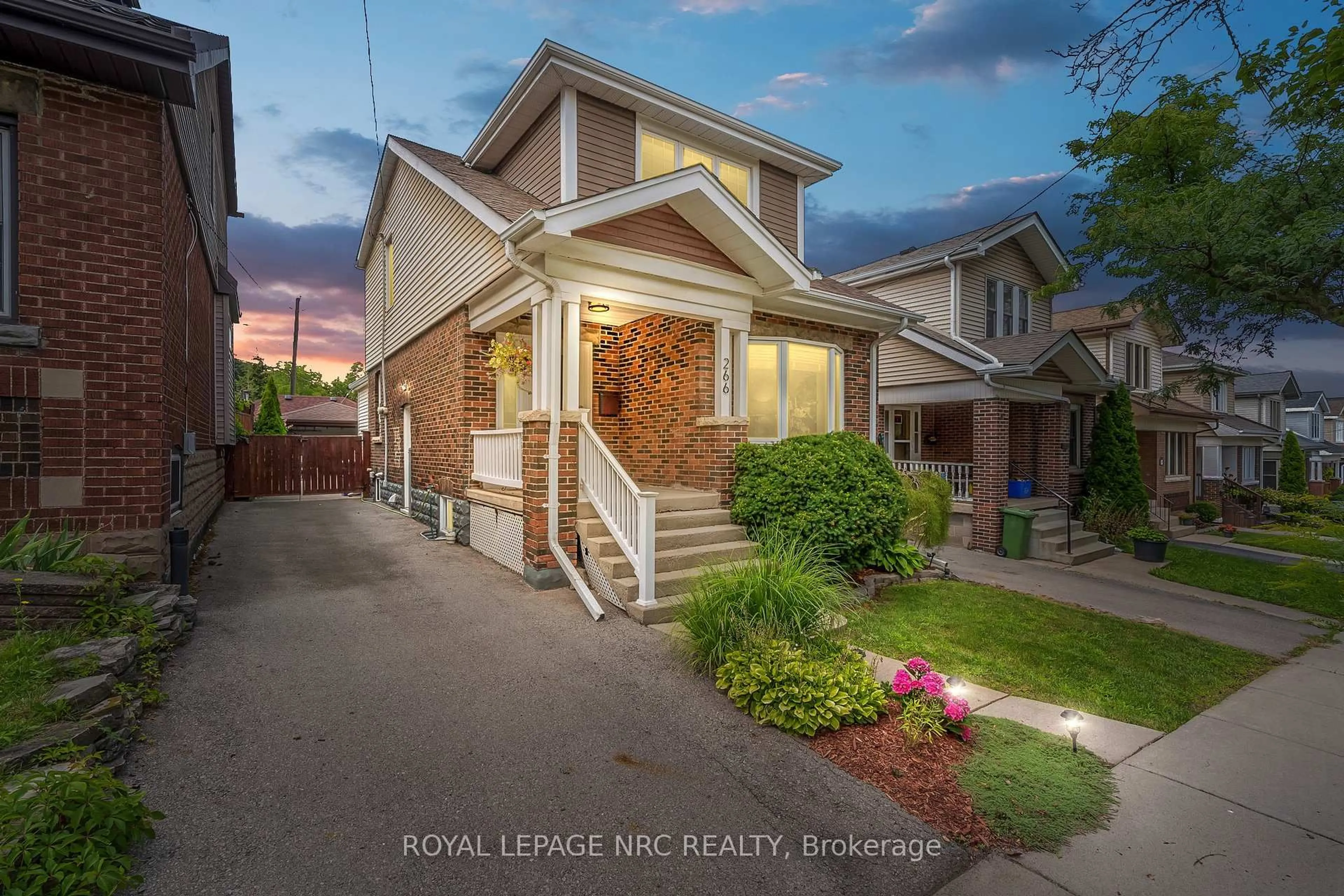 Home with brick exterior material, street for 266 London St, Hamilton Ontario L8K 2H2