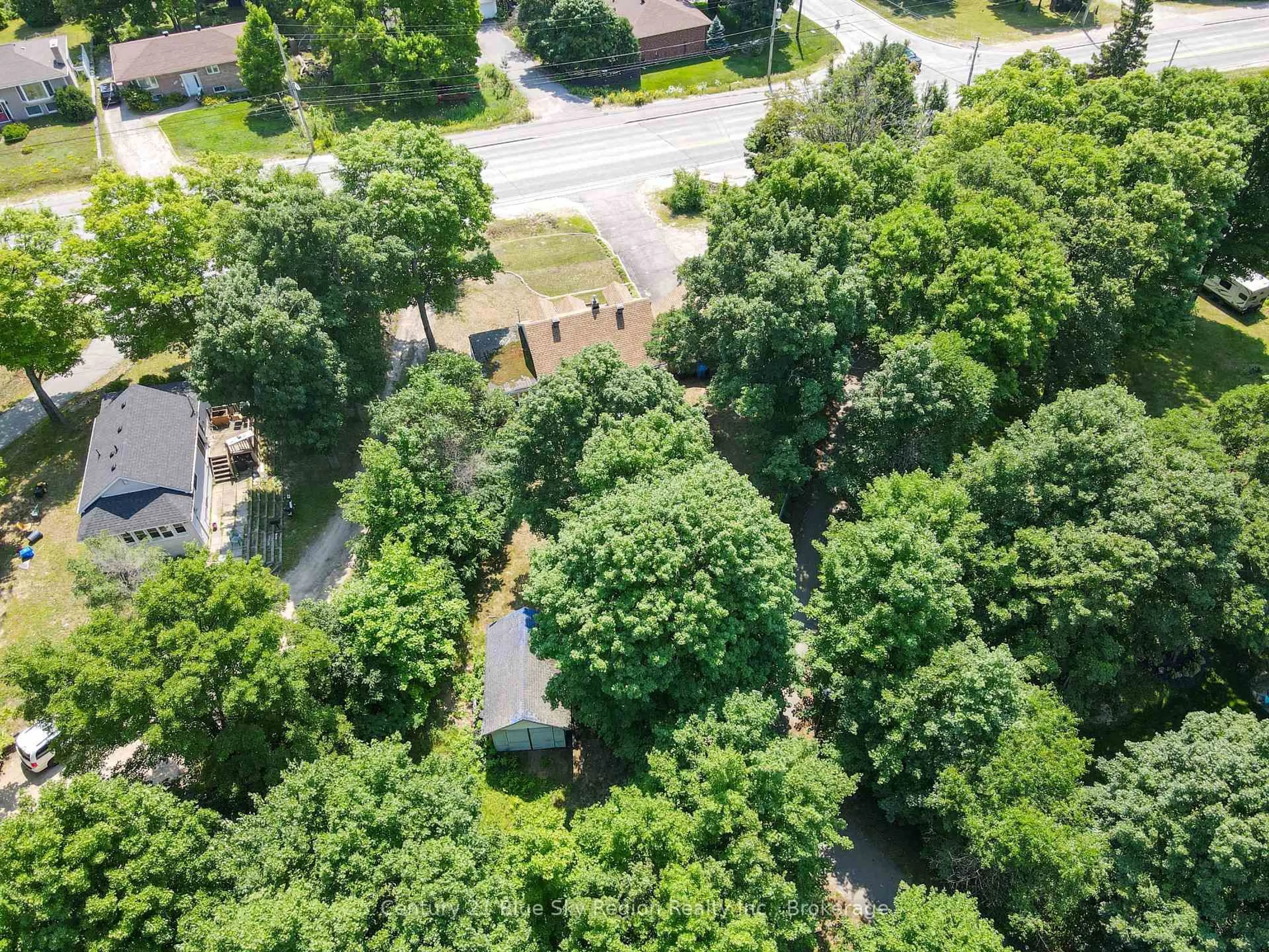 A pic from outside/outdoor area/front of a property/back of a property/a pic from drone, forest/trees view for 732 Airport Rd, North Bay Ontario P1C 1A2