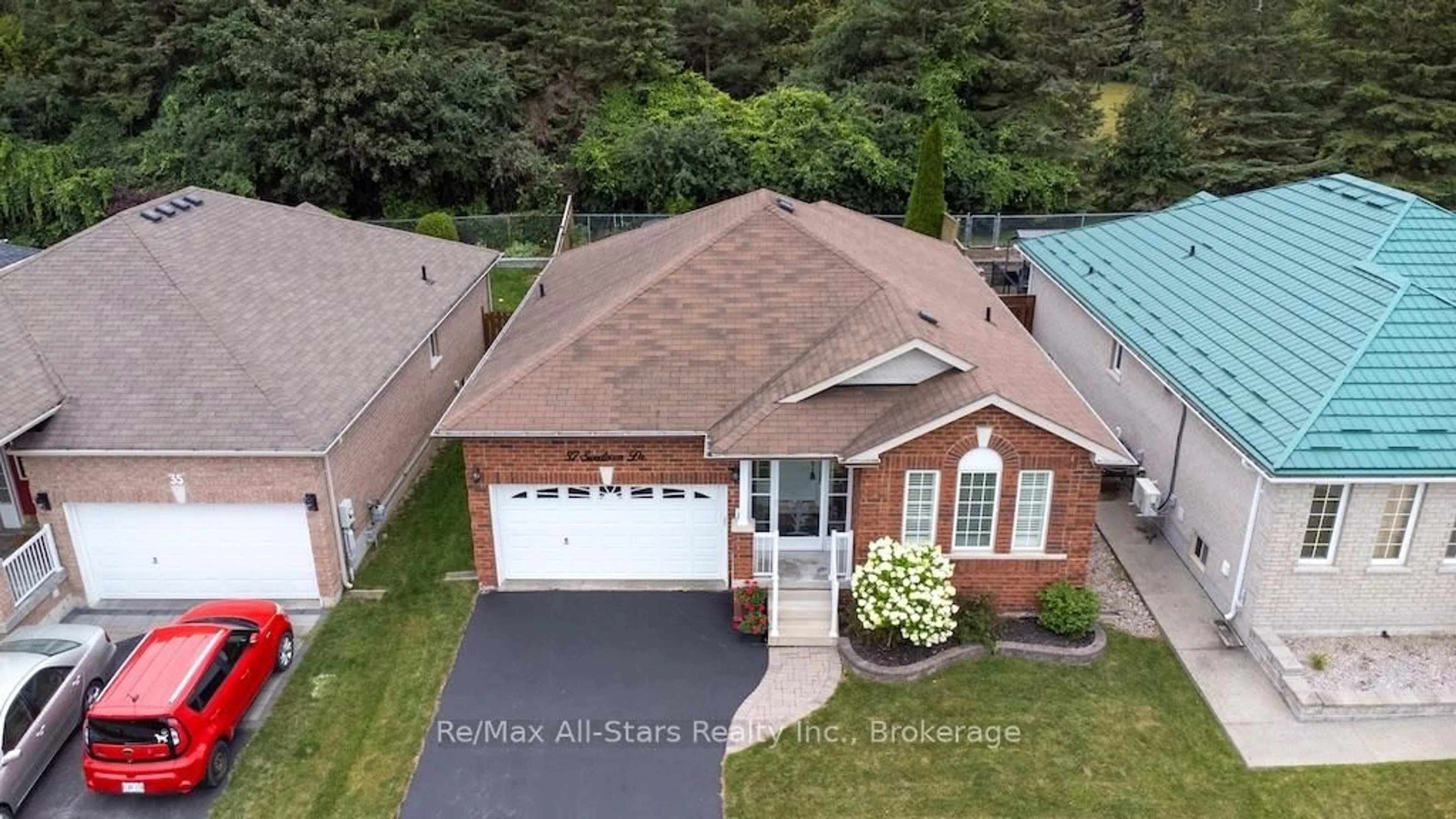 A pic from outside/outdoor area/front of a property/back of a property/a pic from drone, street for 37 Sweetnam Dr, Kawartha Lakes Ontario K9V 0A7