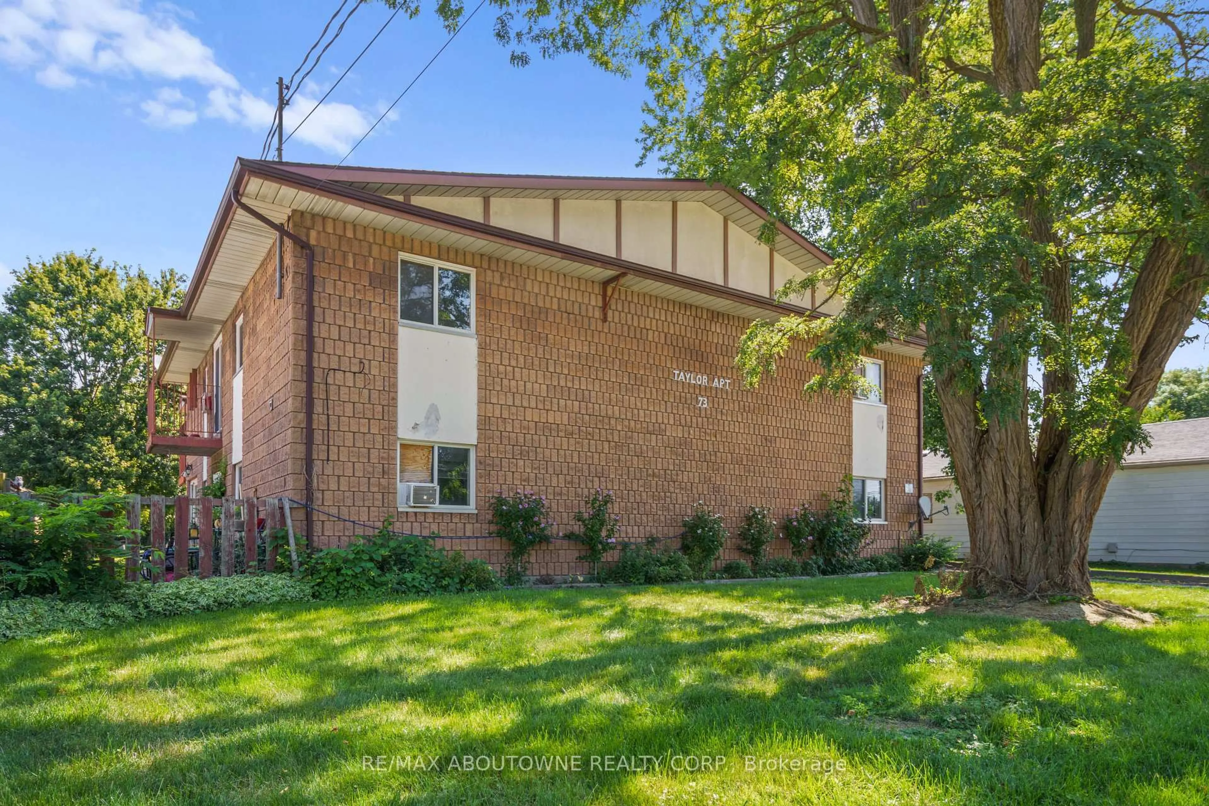 Home with brick exterior material, street for 73 Taylor Ave, Chatham-Kent Ontario N7L 2T7