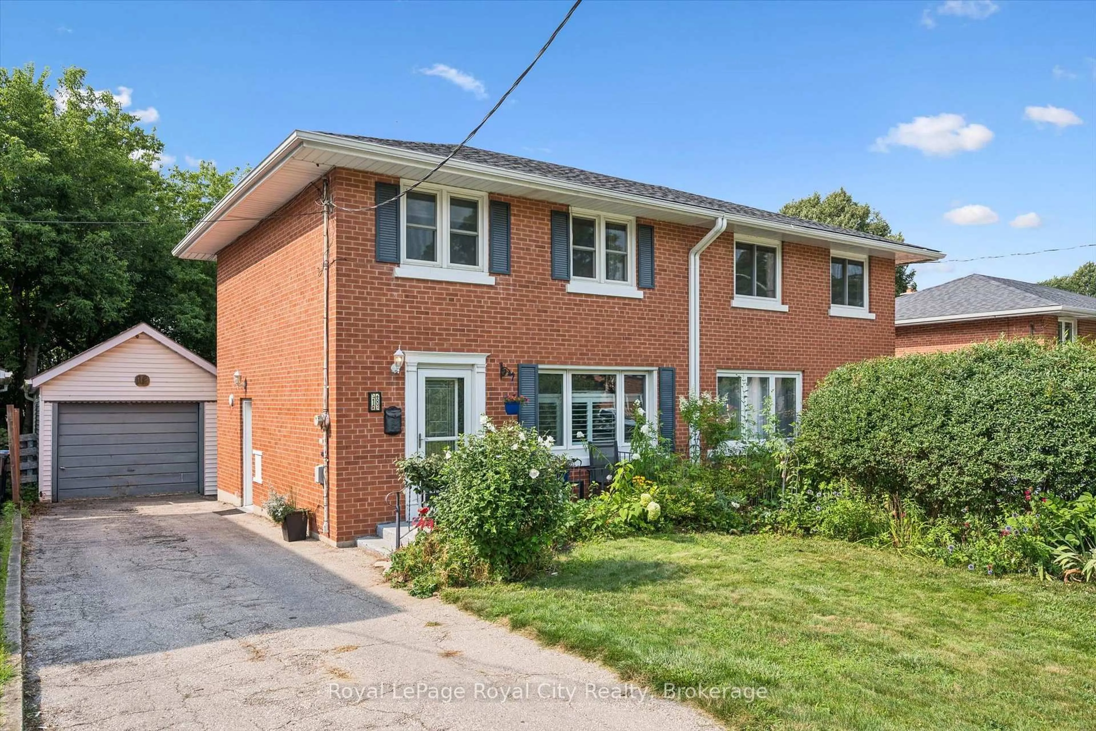 Home with brick exterior material, street for 18 June Ave, Guelph Ontario N1H 1H6